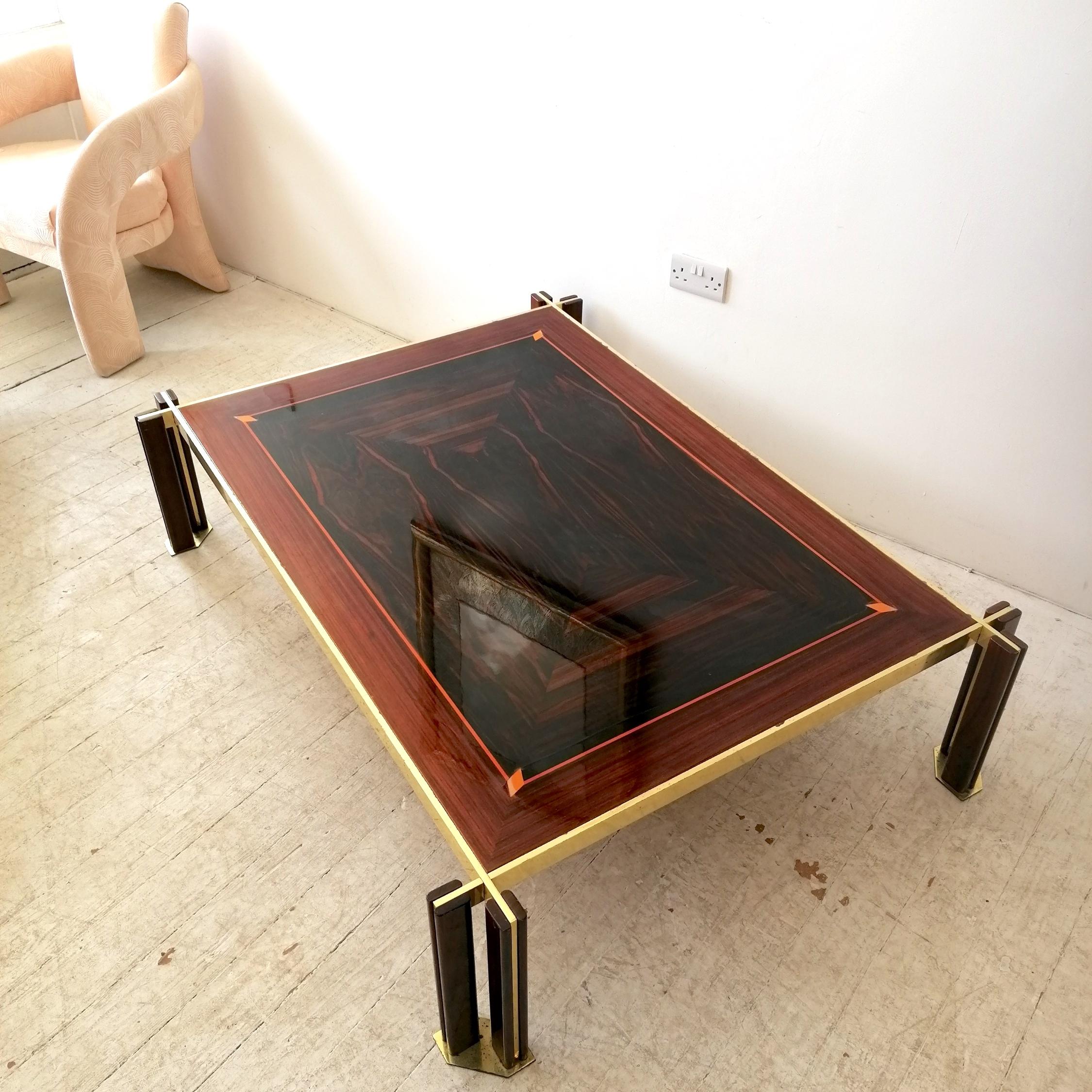 Rare large vintage mid century coffee table by Paolo Barracchia for Roman Deco S.P.A. Italy, 1970s...label is not present, but the table is well documented online. 
Cruciform base in gilt brass. The glossy lacquered marquetry top is made from