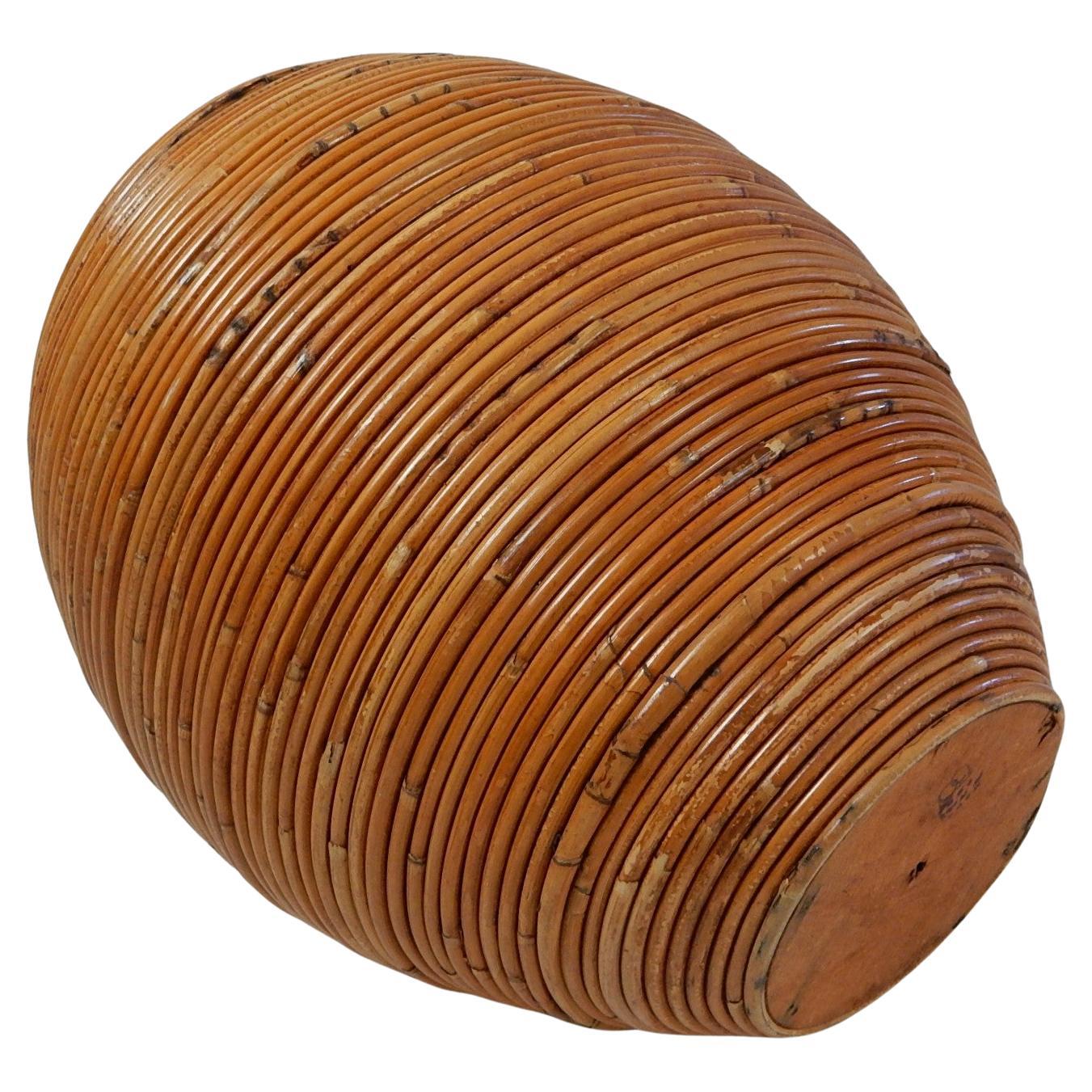 Vase ou panier en roseau signé 