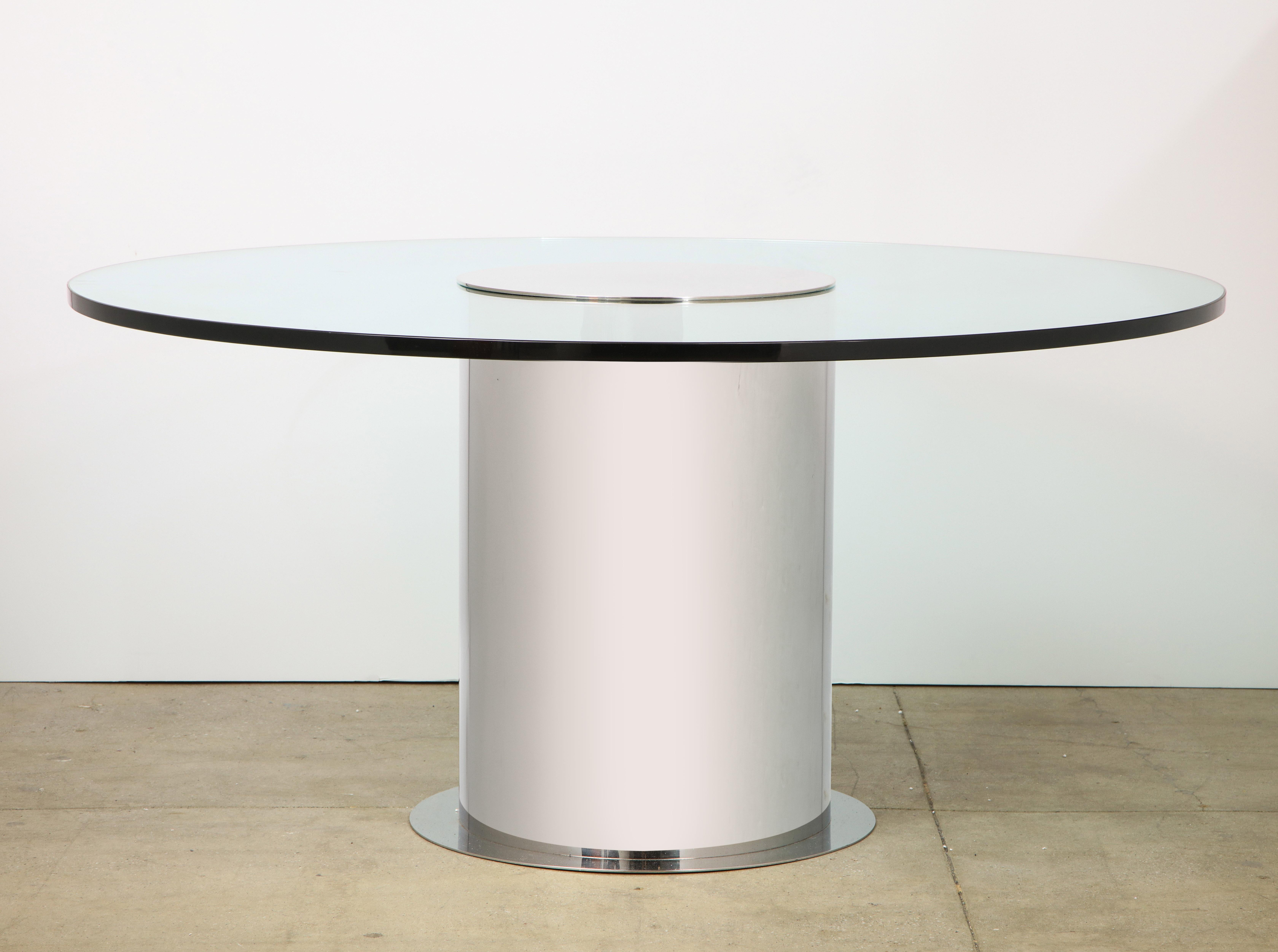 Rare large 1970s Paul Mayen dining table for habitat.
The polished aluminum column base supports a 60