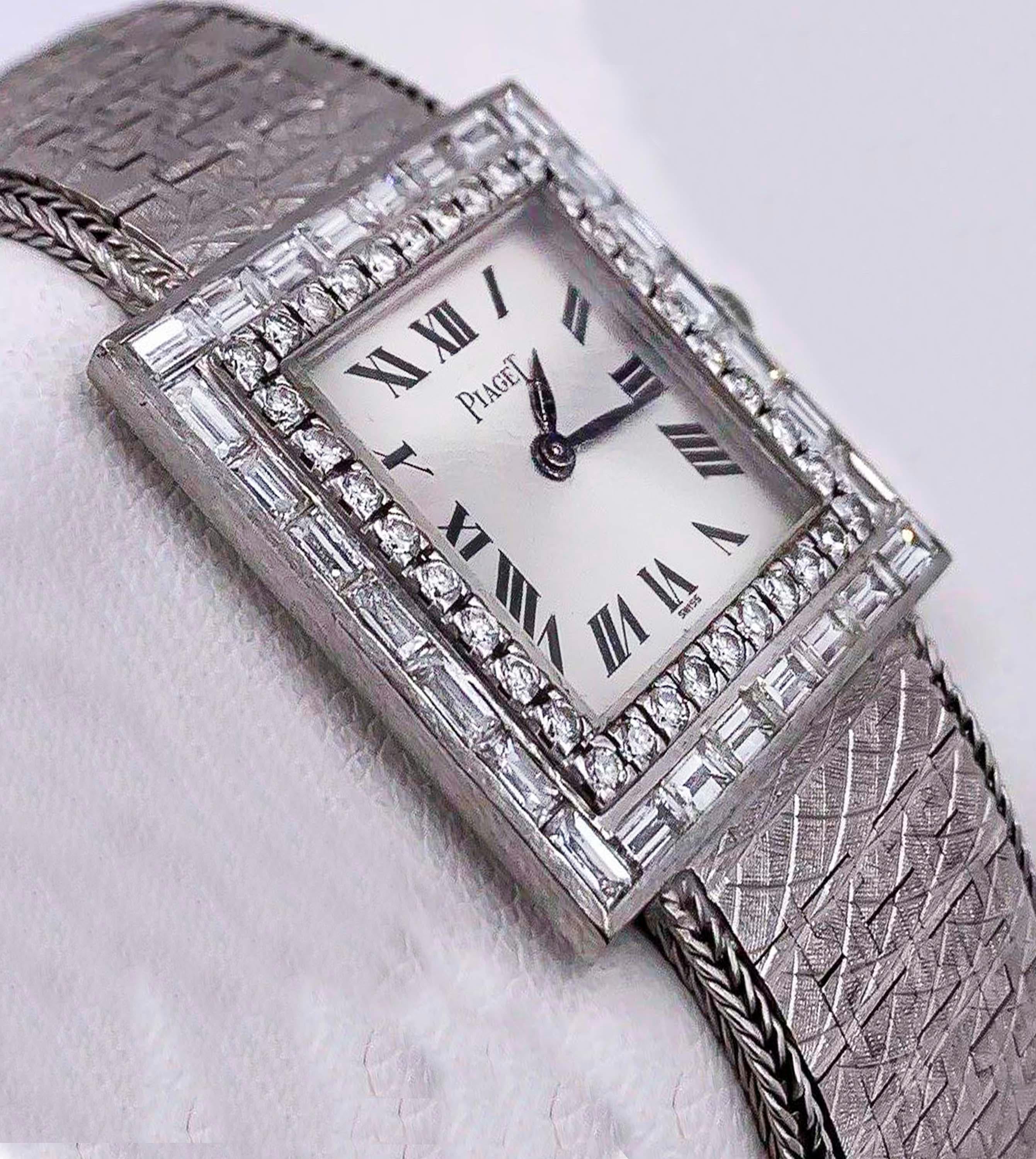 Baguette Cut Large 1970s Piaget 18kt Double Diamond Row Roman Numeral Textured Bracelet Watch For Sale