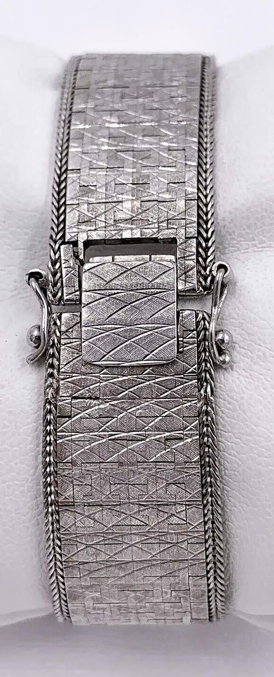 Large 1970s Piaget 18kt Double Diamond Row Roman Numeral Textured Bracelet Watch For Sale 2