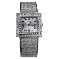 Large 1970s Piaget 18kt Double Diamond Row Roman Numeral Textured Bracelet Watch