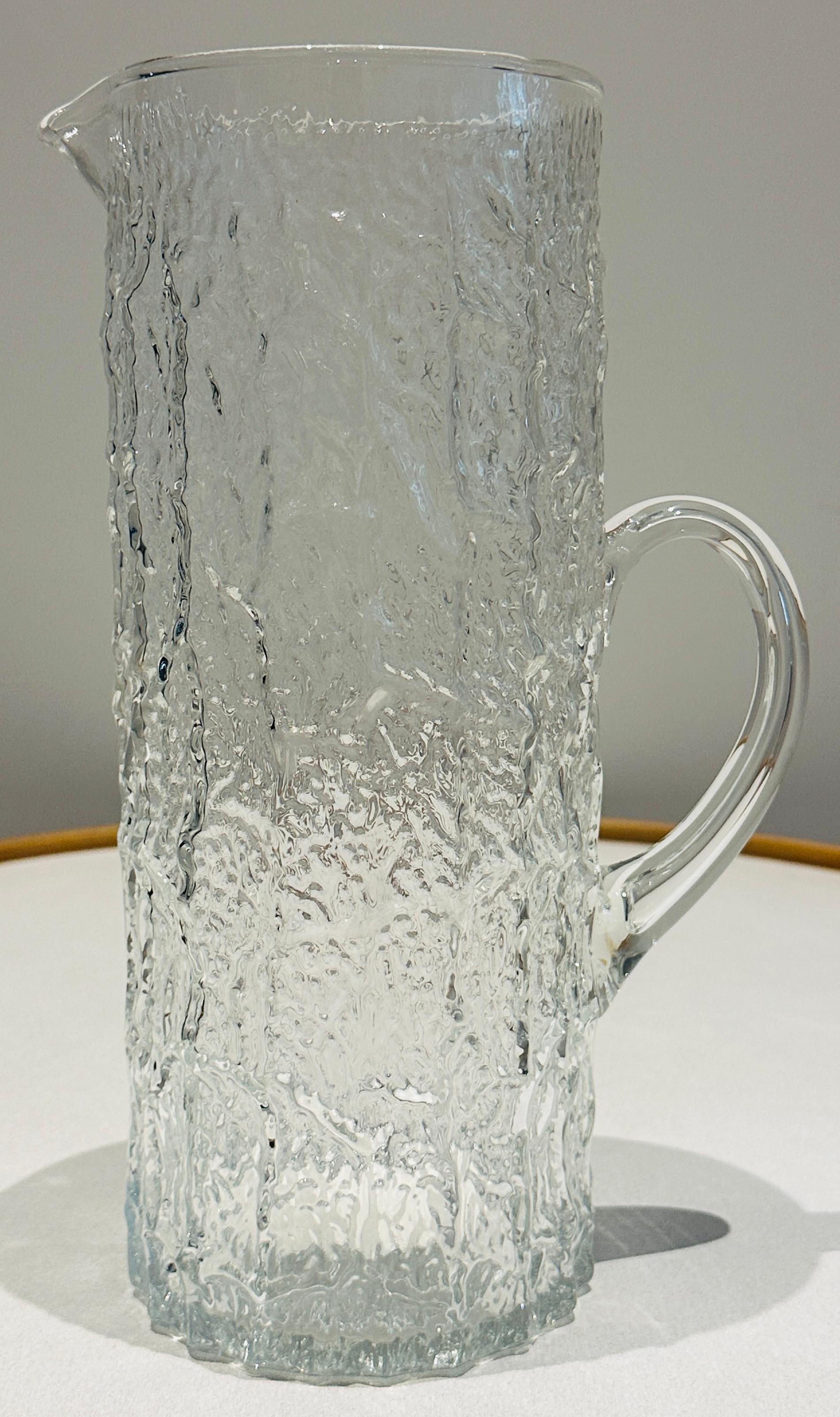 Large 1970s heavily textured exterior glass pitcher or jug, with an 