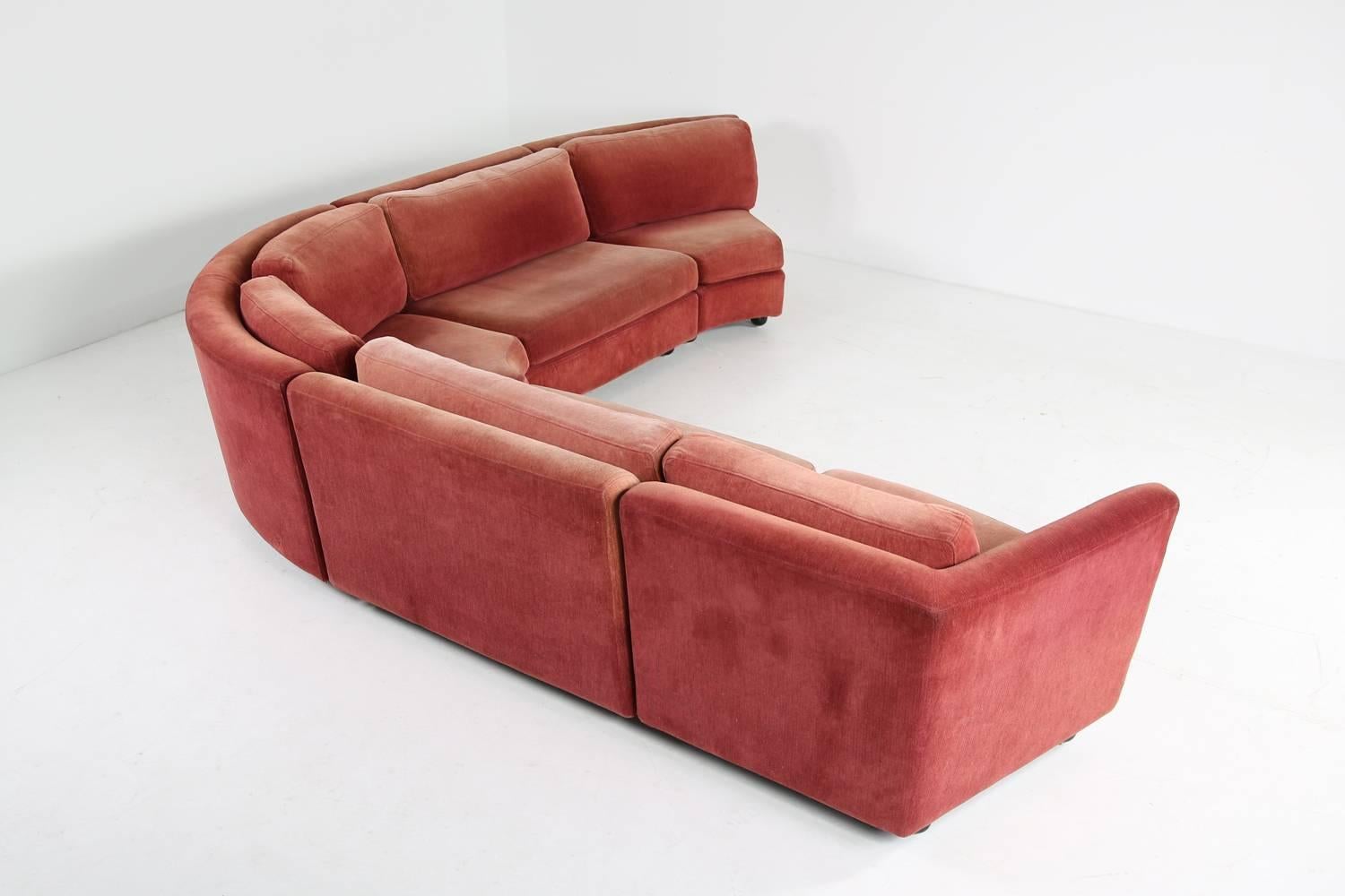 Cool landscape seating, sofa by Niels Eilersen, light red, patina, extremely comfortable, freestanding, modular system, it's possible to arrange the middle, straight parts as desired, like in the pictures, or both straight elements in one row, this