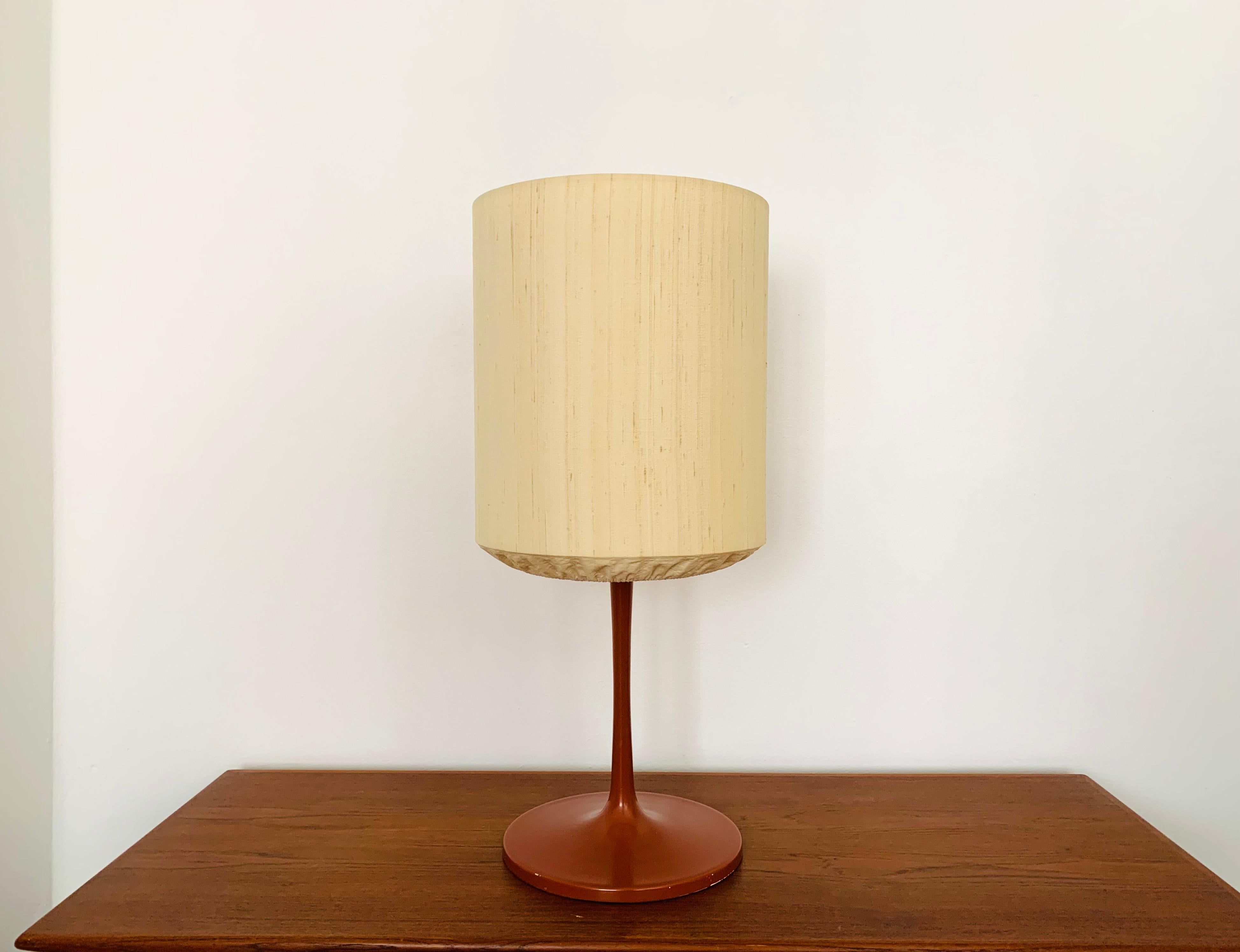Large and beautiful table lamp from the 1970s.
Impressive design and very high-quality workmanship.
The lighting effect of the lamp is extremely beautiful.

Manufacturer: Staff
Around 1970

Condition:

Very good vintage condition with slight signs
