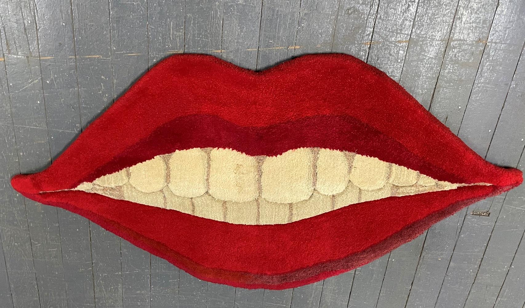 Large 1970s Pop Art Wall Mounted Lips Rug. Pop Art made of wool.  The back has a half wood section with the wire for hanging purposes. 