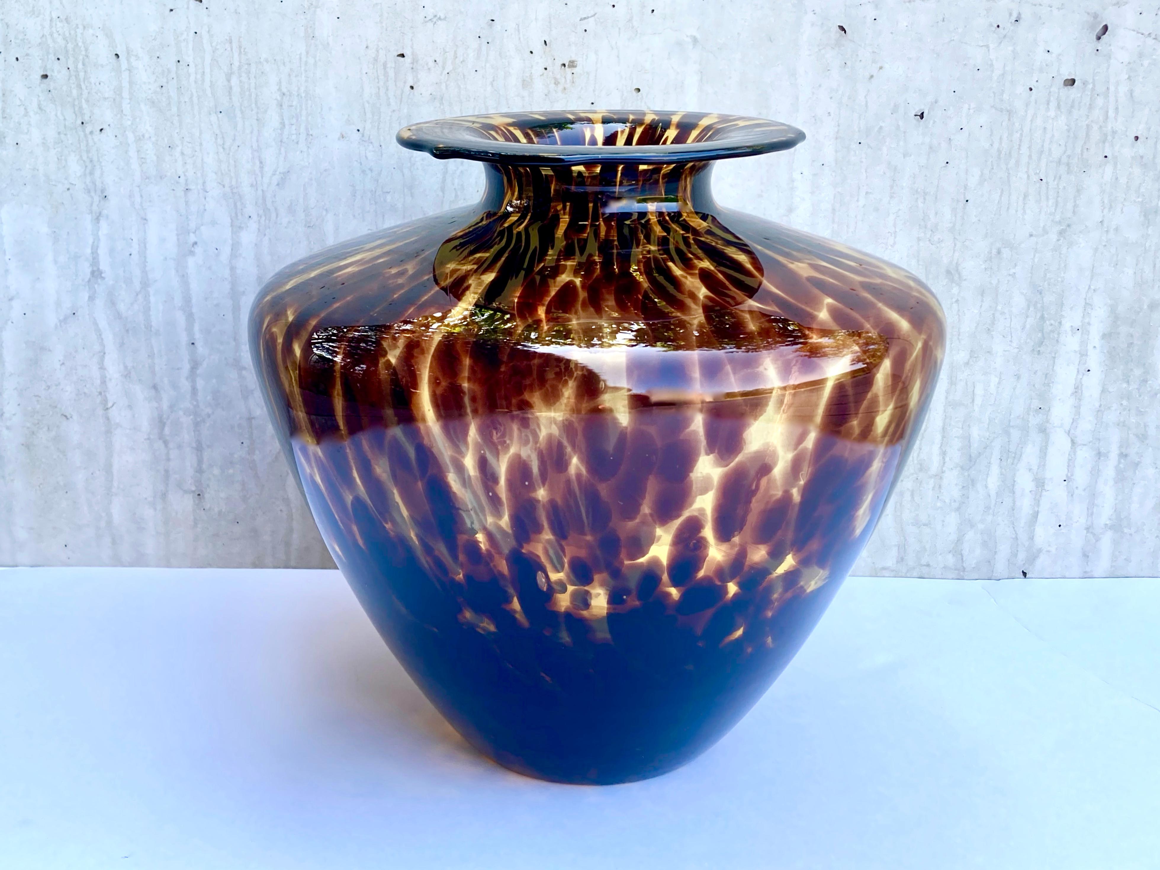A French-Italian cooperation. This very impressive, hand blown Murano glass vase was made for the French luxury brand Lancel (the vase still features the original label, see photo of the rim). The vase is made in a so called tortoise shell pattern