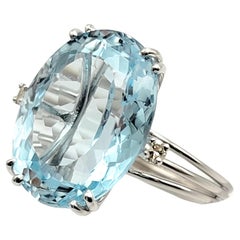 Large 19.94 Carat Oval Light Blue Topaz and Diamond Statement Cocktail Ring
