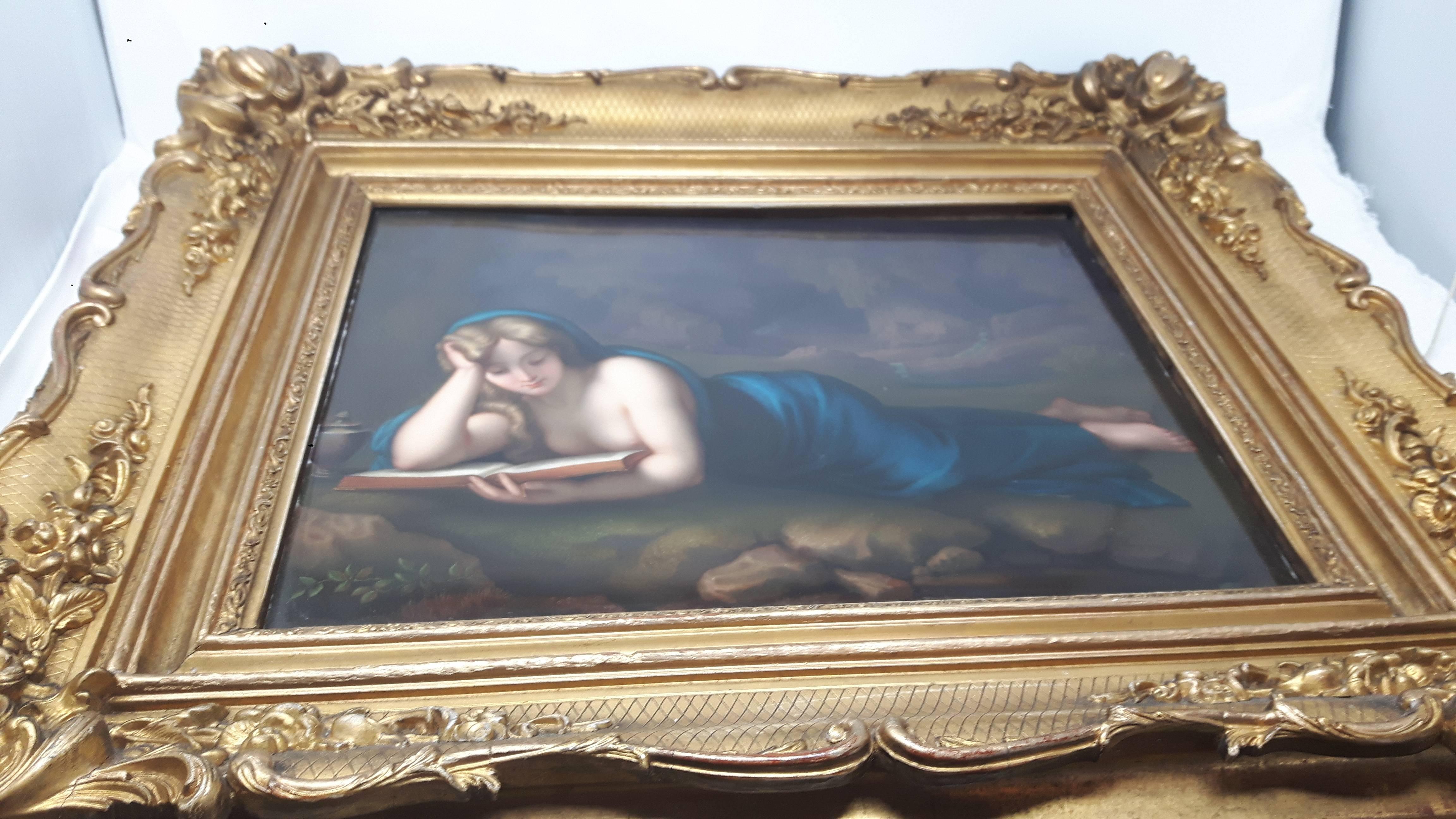 A beautiful mid-19th century porcelain plaque of a semi-nude woman in a blue toga, reclining by a lake and reading a book.
Probably German, Dresden factory, circa 1860.
