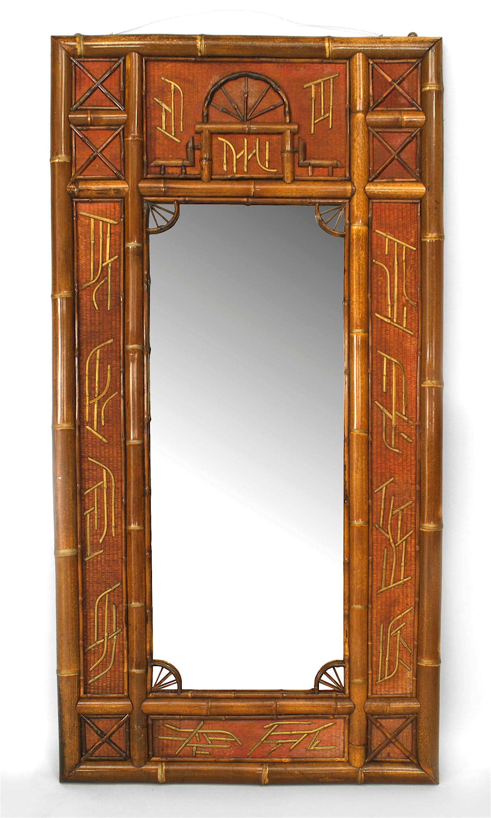 English Victorian (19th century) large rectangular bamboo wall mirror with a red rush matted frame border trimmed with strips of bamboo.
           