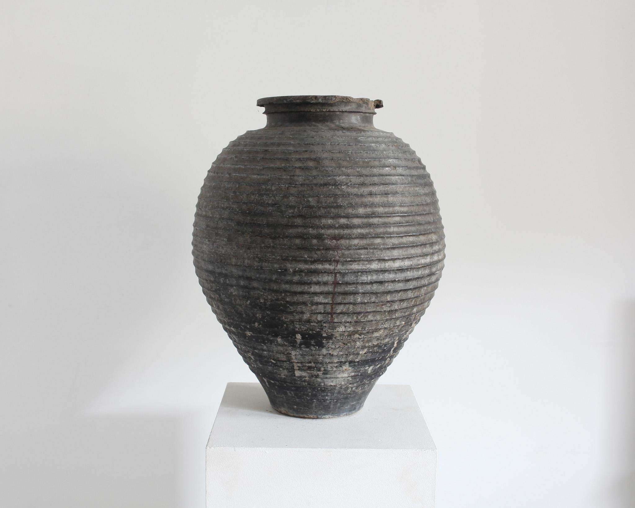large black terracotta vase