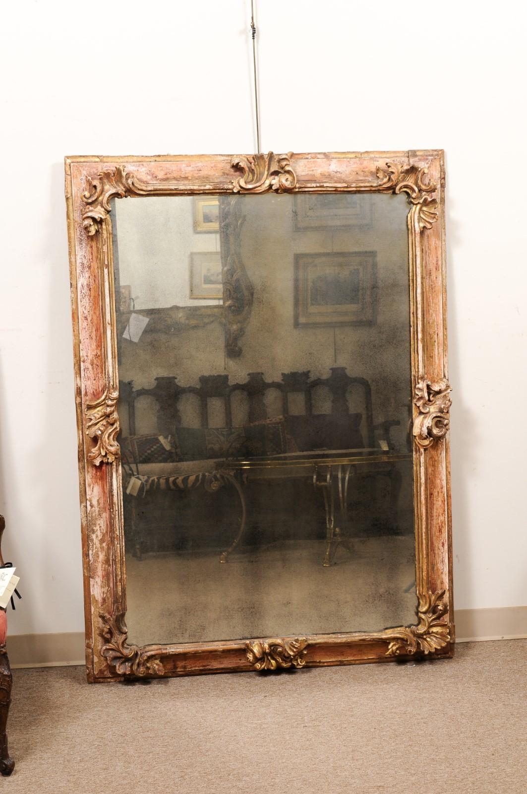European  Large 19th C Continental Rococo Style Mirror w/ Stripped Gilt /Red Gesso finish For Sale