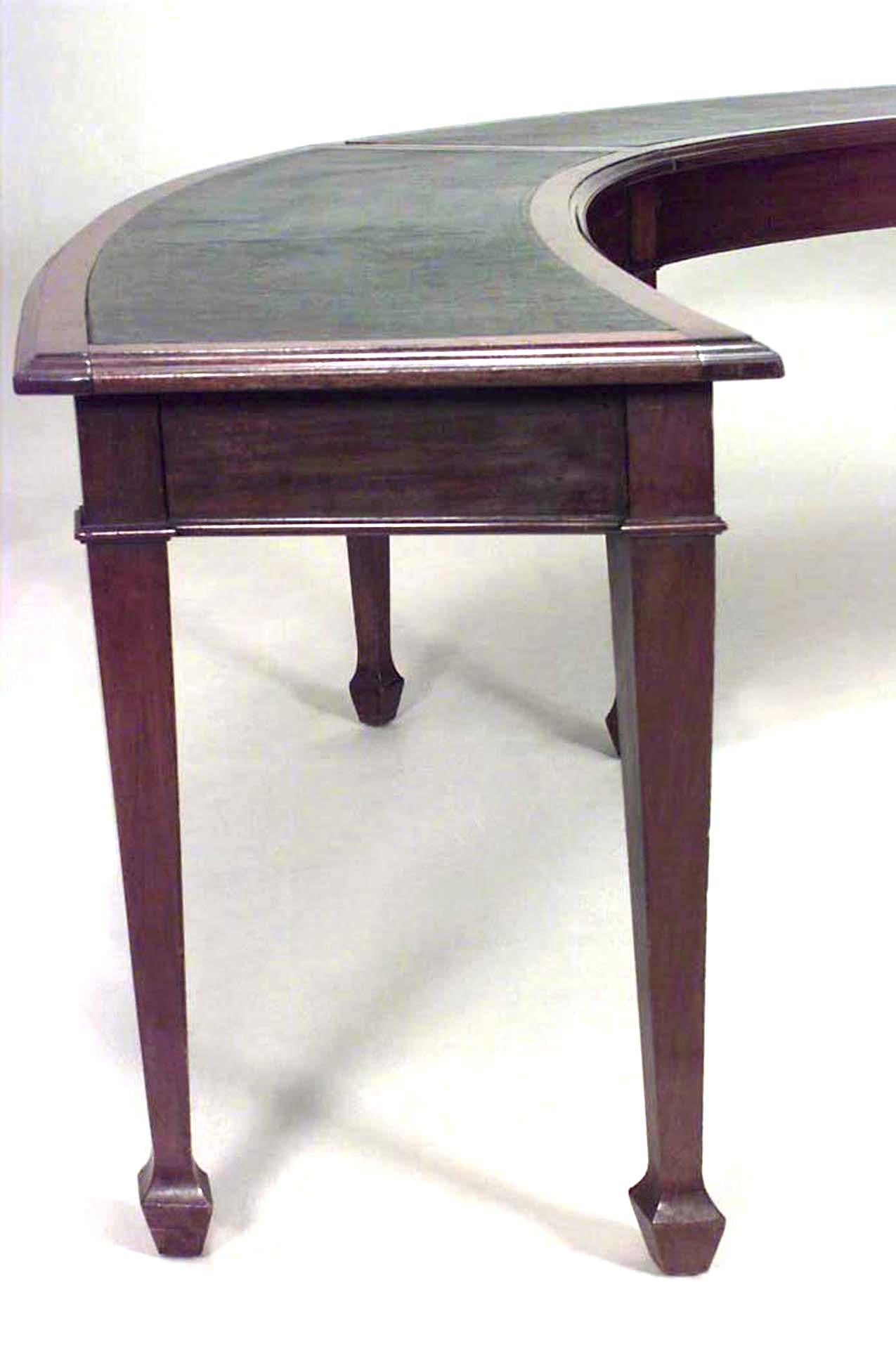 English Sheraton-style (19th Century) large mahogany 4 section horseshoe shaped hunt/conference table with black leather top.
