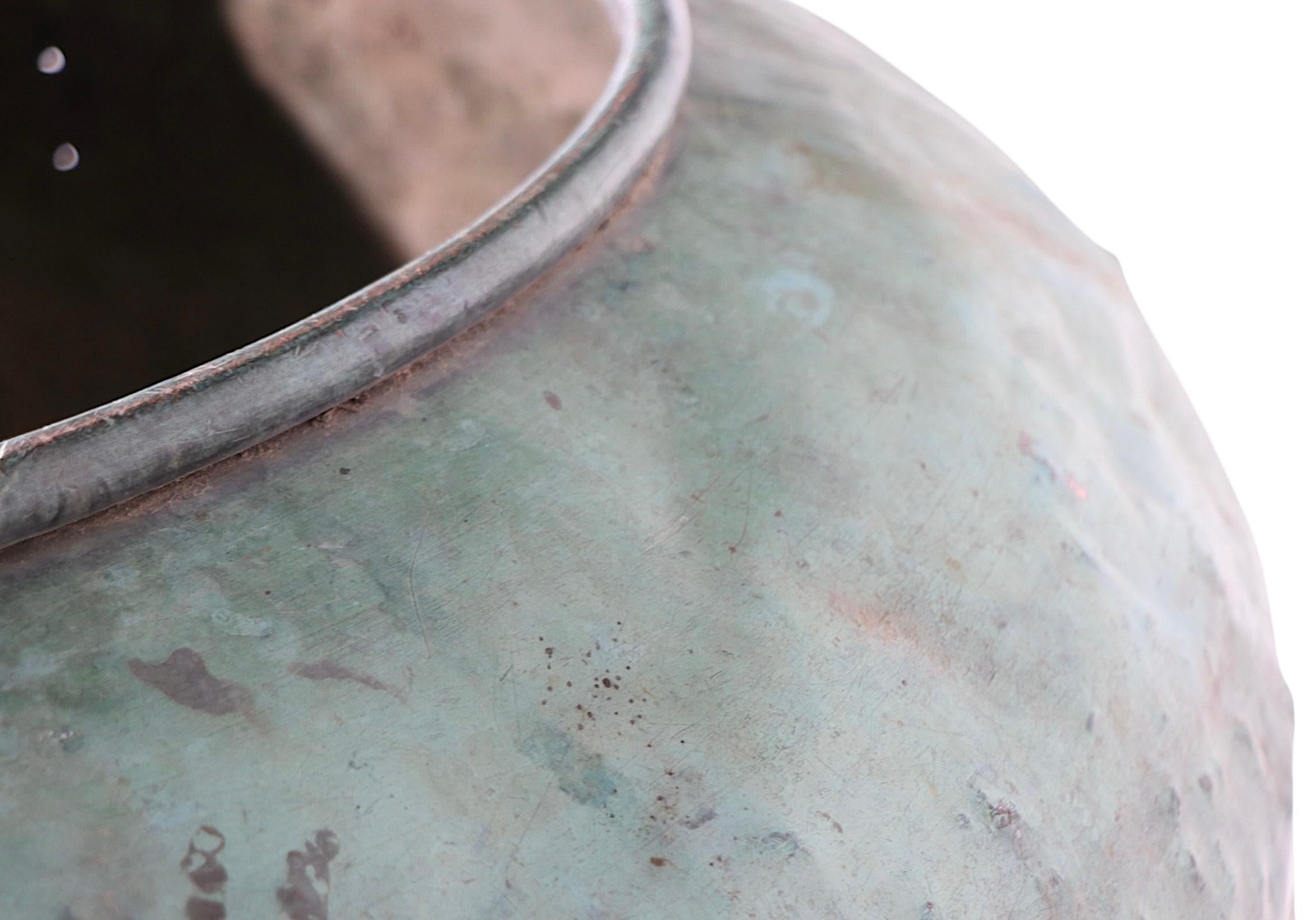 Incredible over-scale copper chocolate pot, or vat, in attractive original verdigris finish. This impressive pot can be repurposed as a large planter, or just a stand alone sculptural garden objet. 19th century vintage, mostly likely French in