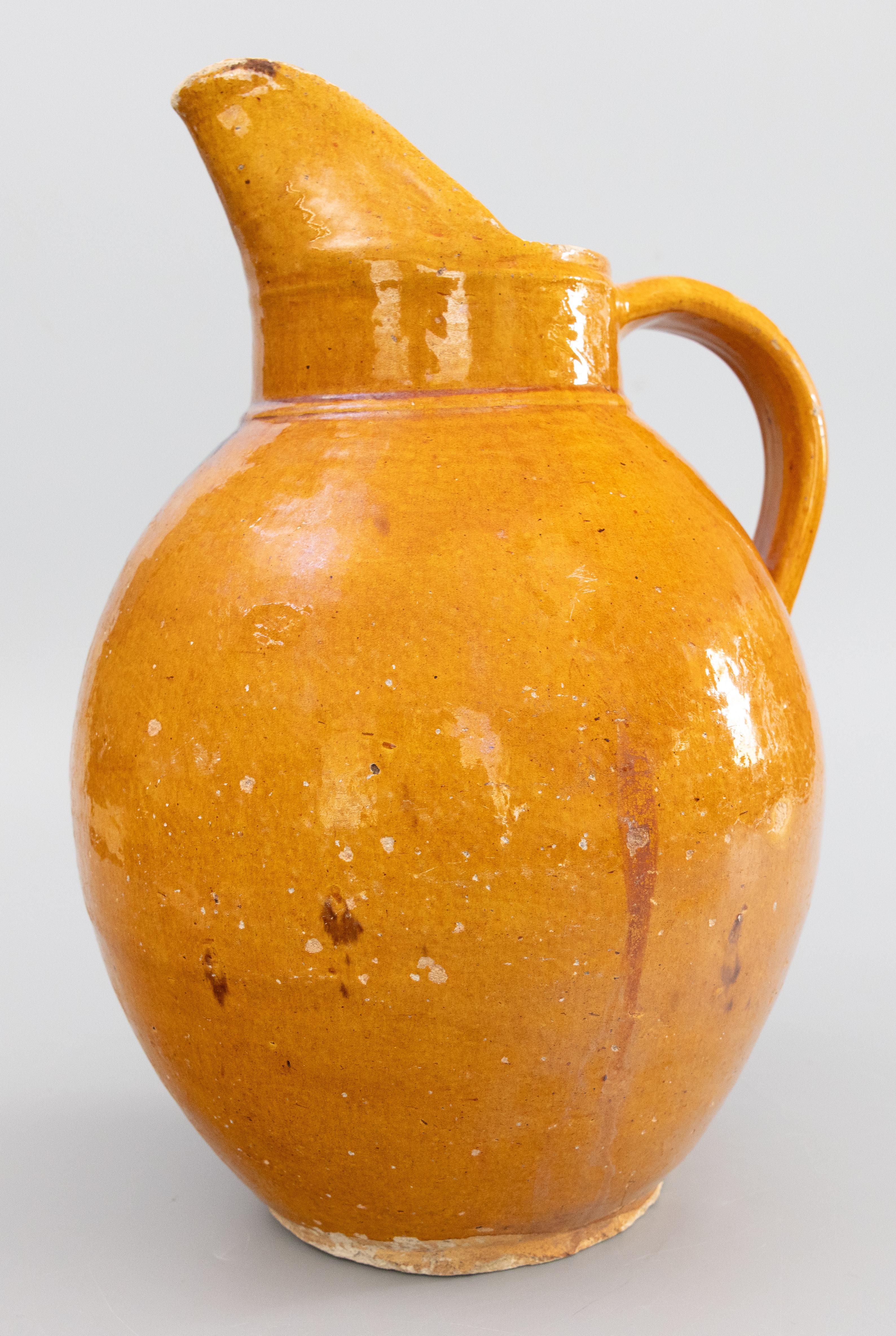 19th Century Large 19th C. French Country Ocher Yellow Glazed Terracotta Pitcher Jug Ewer For Sale