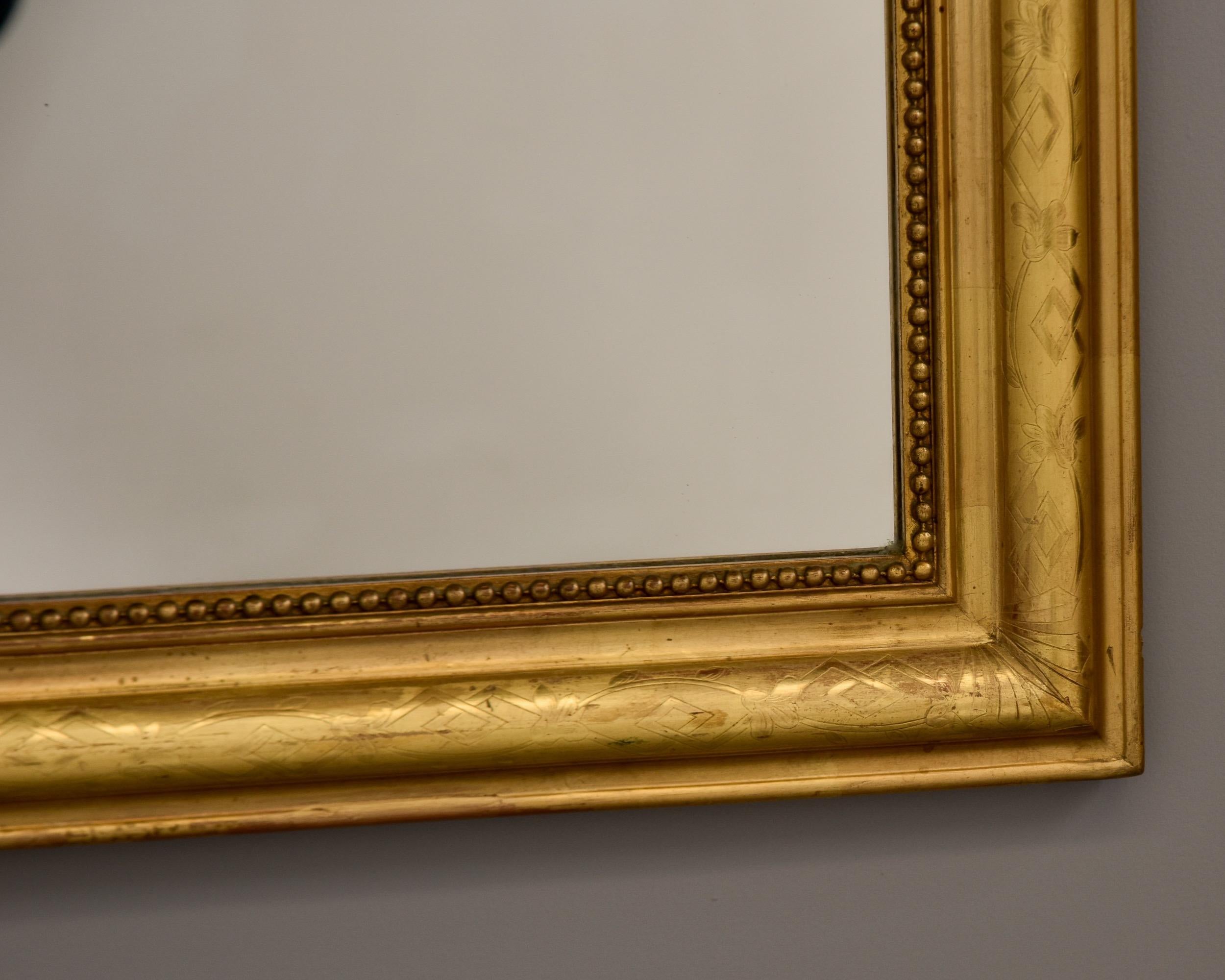 Miroir Grand miroir encadré en bois doré de Louis Philippe, C.C.  en vente
