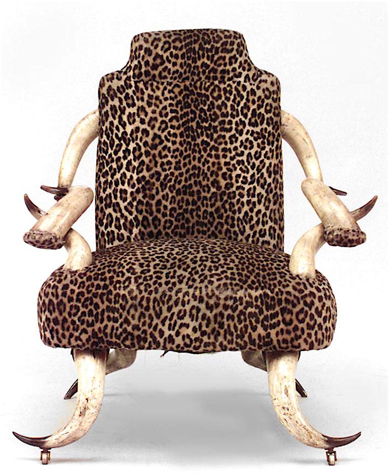 Rustic Continental (19th Century) horn design large arm chair with head rest and leopard upholstered seat and back.
