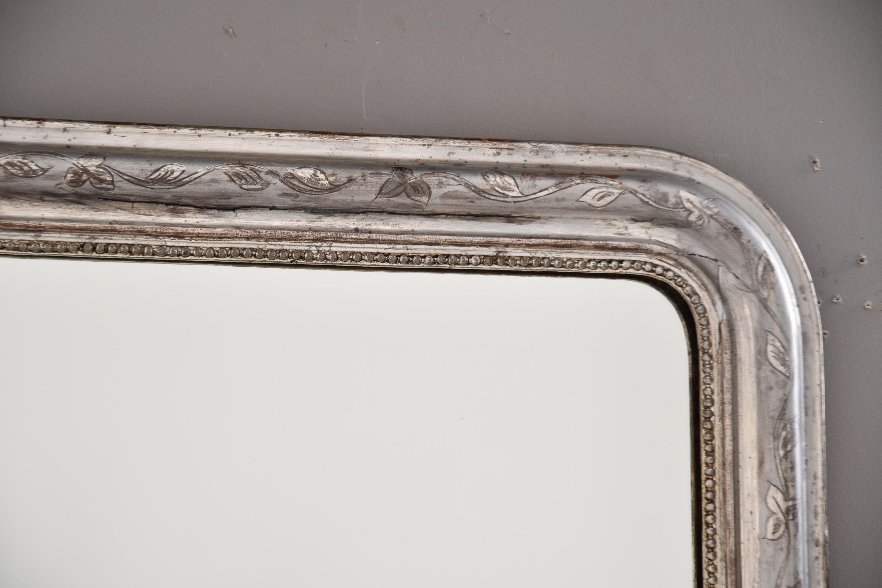 Grand miroir Louis Philippe en argent et en vermeil du 19ème C. 1