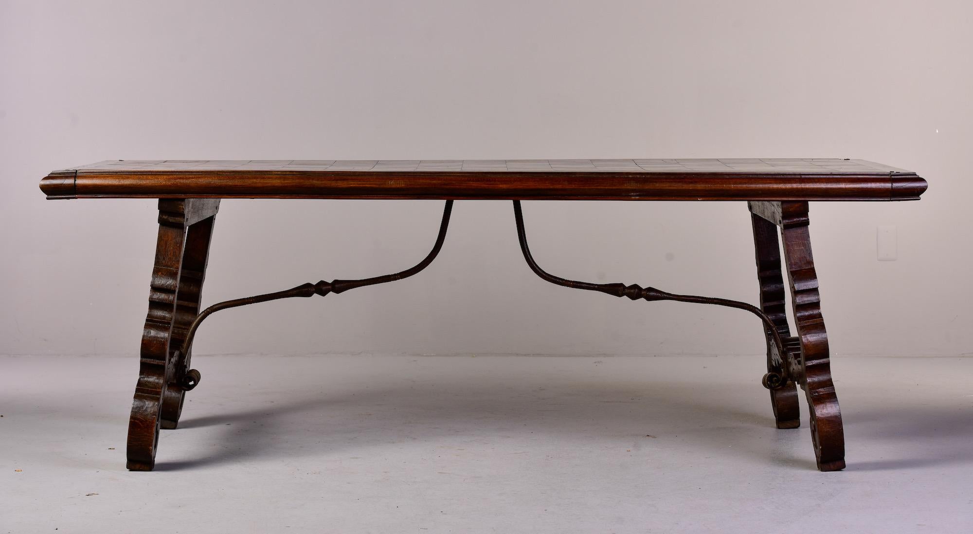 Spanish Colonial Large 19th C Spanish Walnut Table with Marquetry Top and Iron Stretcher For Sale