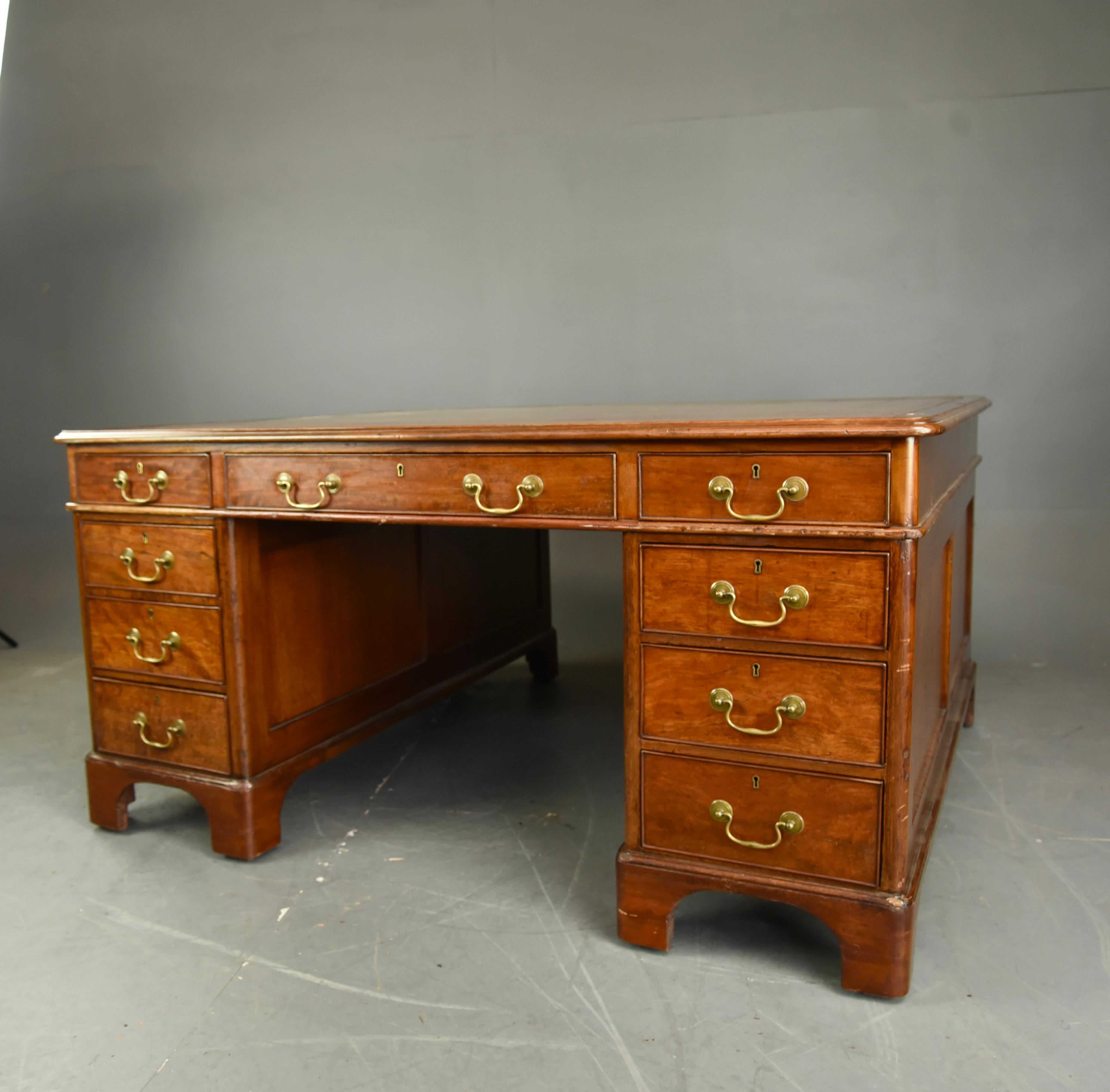A fantastic large Victorian mahogany partners desk .
The desk has18 drawers in total  9 each side that all slide nice and smooth as they should they are all solid mahogany lined with fine hand dovetails .
The has a wonderful colour and grain with a