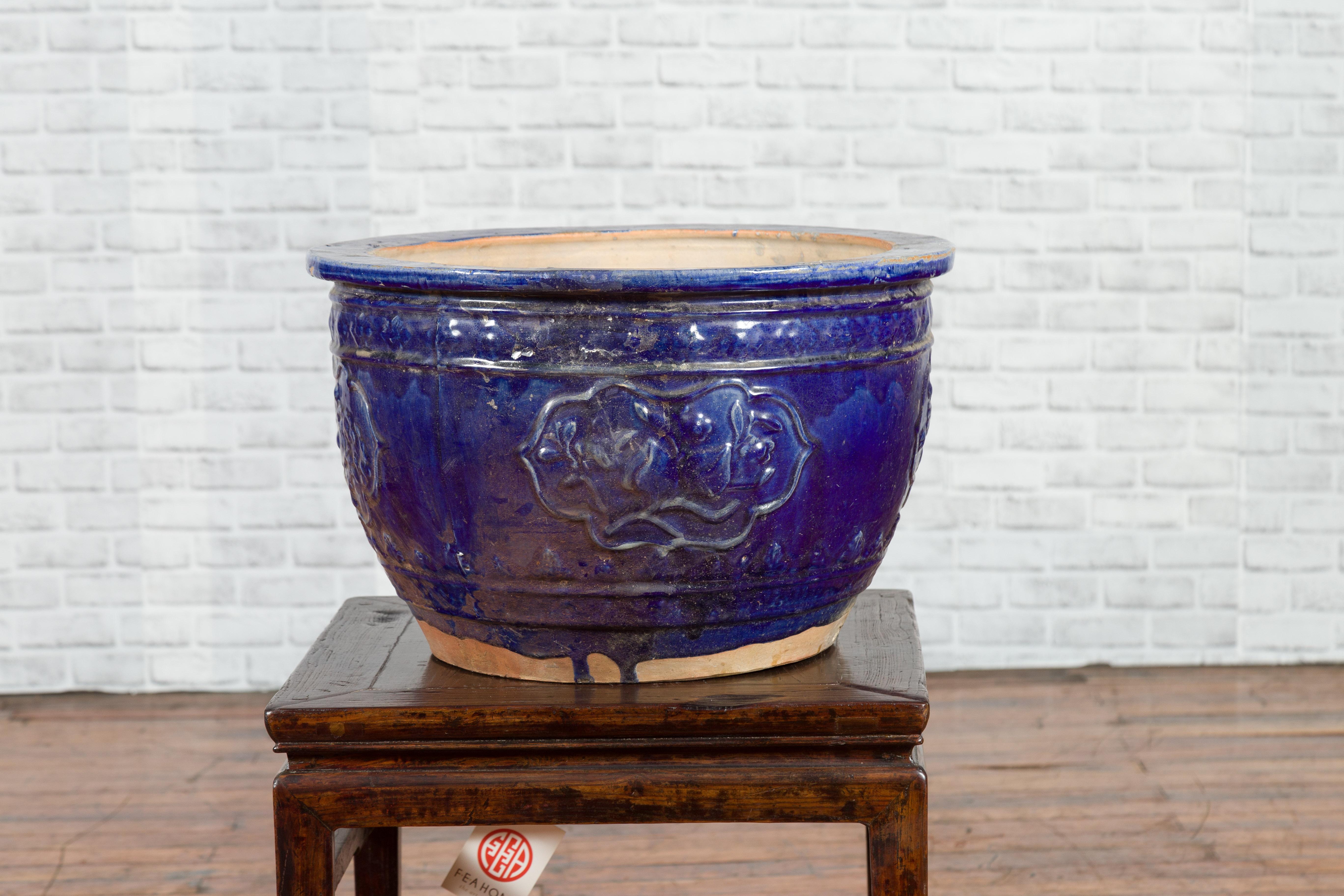 Vietnamese Large 19th Century Annamese Royal Blue Circular Planter with Floral Décor For Sale