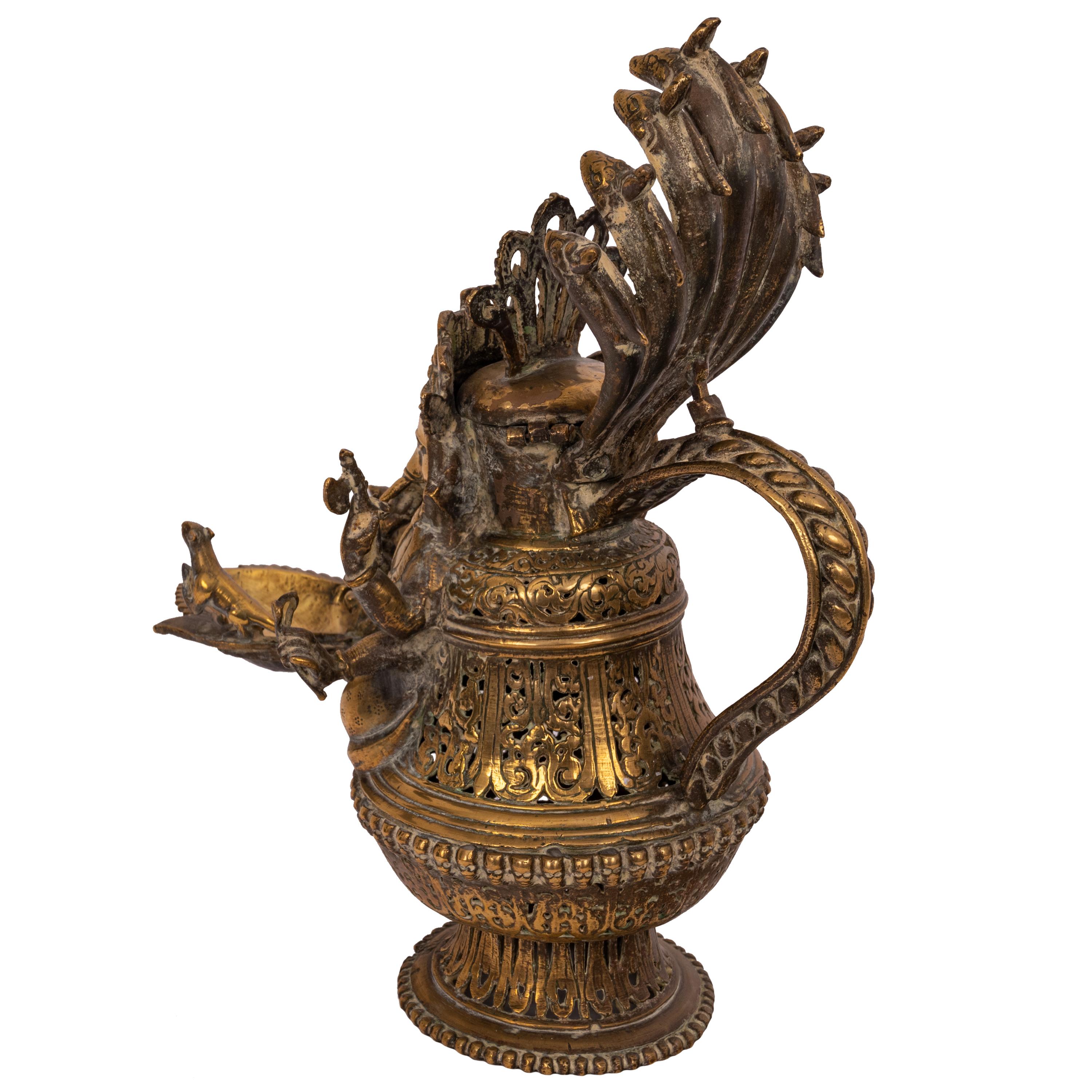 Moulage Grande lampe à huile indienne antique Ganesh figurative en laiton du 19ème siècle en vente
