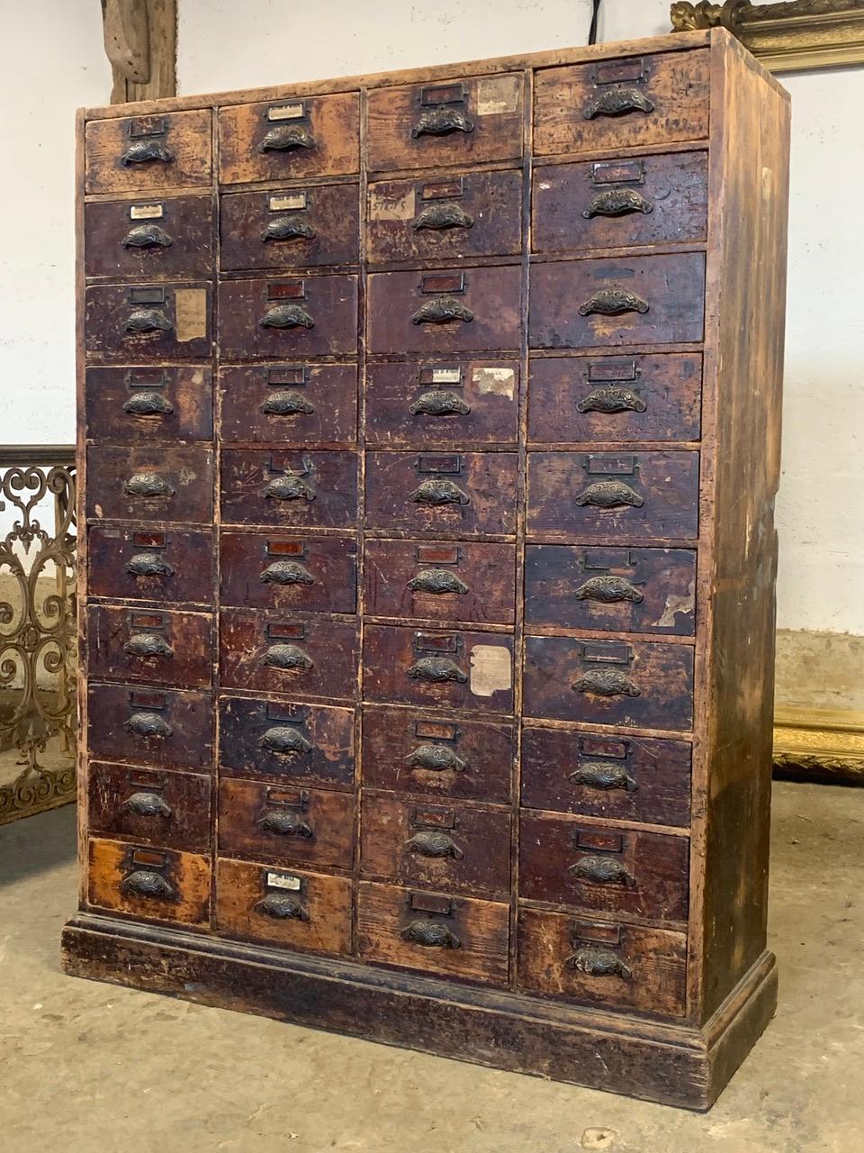A lovely 19th century bank of wooden drawers with original handles. The wood has a nice patina and wear from many years of use. I nice original solid condition ready for use.
 