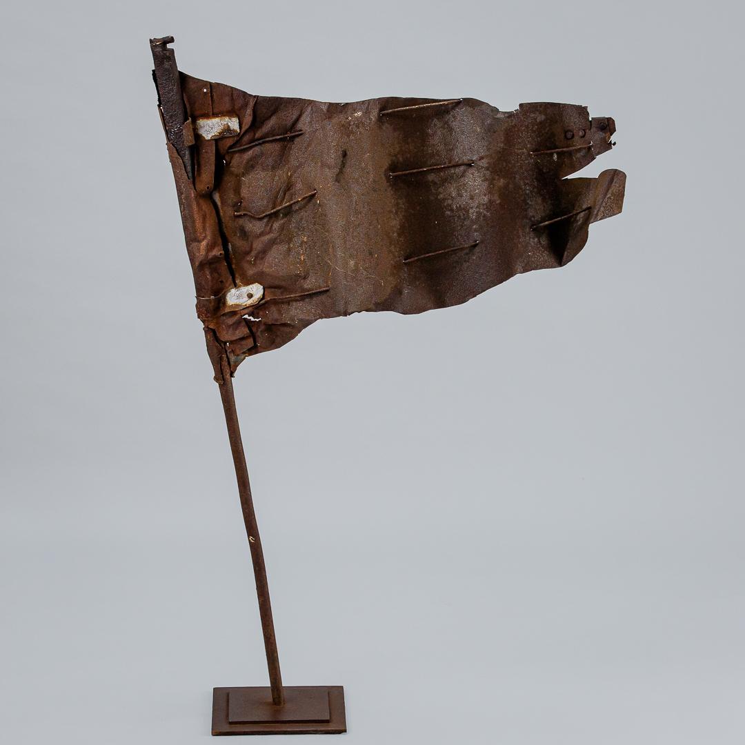 Remarkable survivor, Large19th century billowing sheet metal flag, heavily weathered, wonderfully sculptural. Later Stand. France circa 1880.
Dimensions: 68cm x 104cm x 20cm.