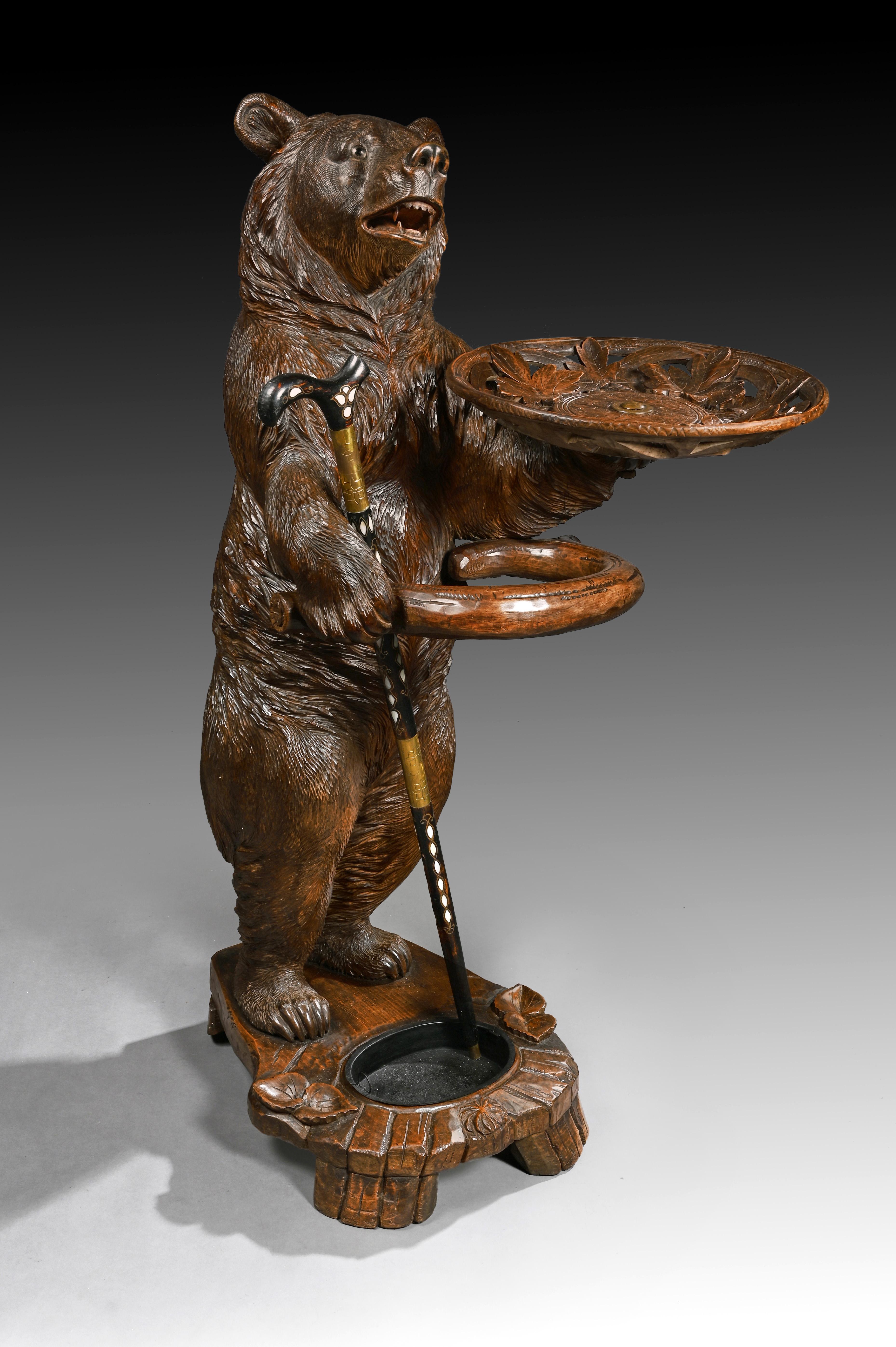 A very large and extremely good quality 19th century Swiss Black Forest bear stick / umbrella stand.

Brienz, Switzerland, circa 1890.

Standing 1.2 meters tall, carved from Linden wood in the Brienz region of Switzerland, a wonderful and rare
