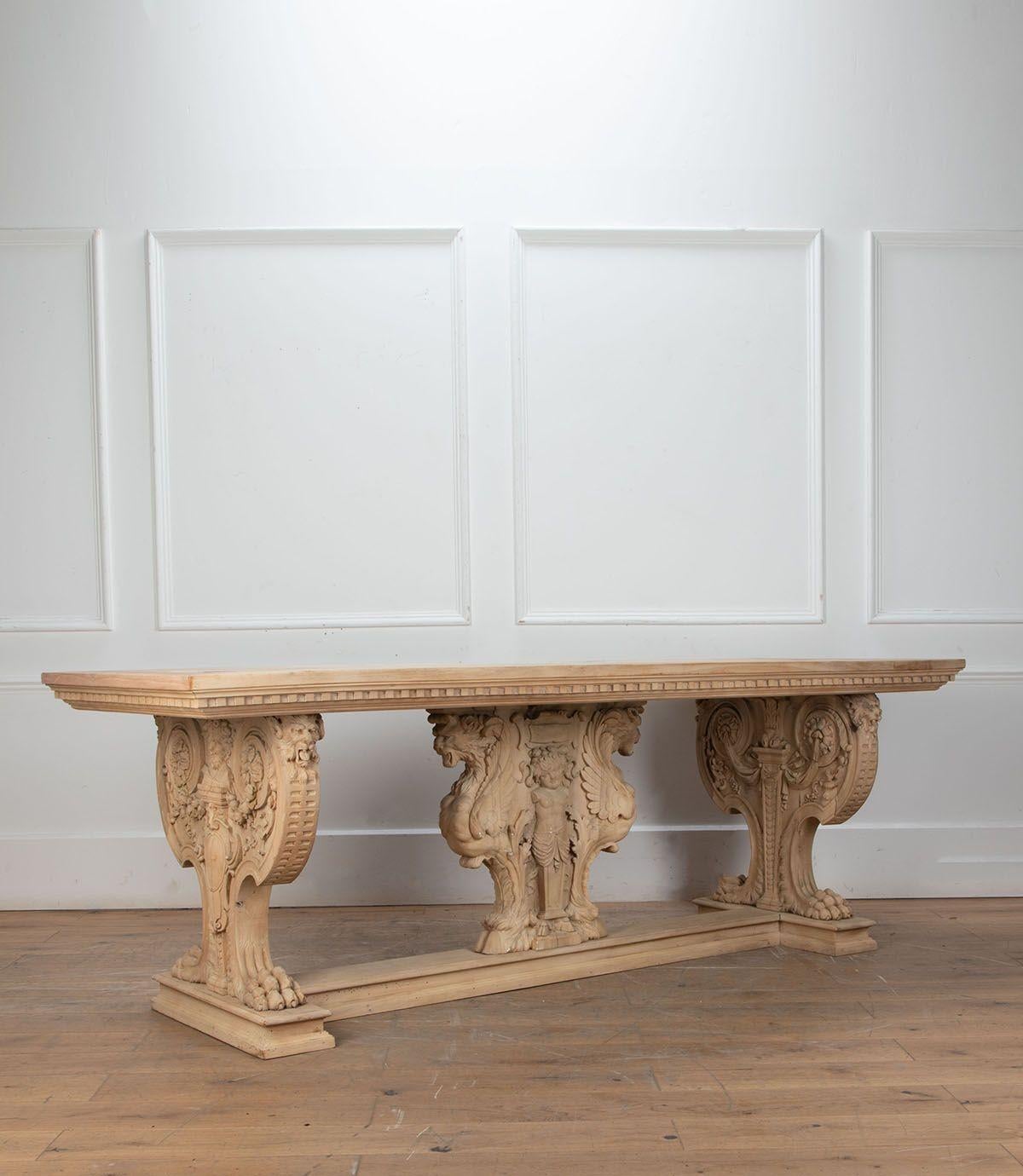 Superb large 19th Century French, Renaissance style, Country House entrance hall centre table.
Fine hand carved Neoclassical details in solid walnut with a cleaned back bleached finish.
Circa 1880.