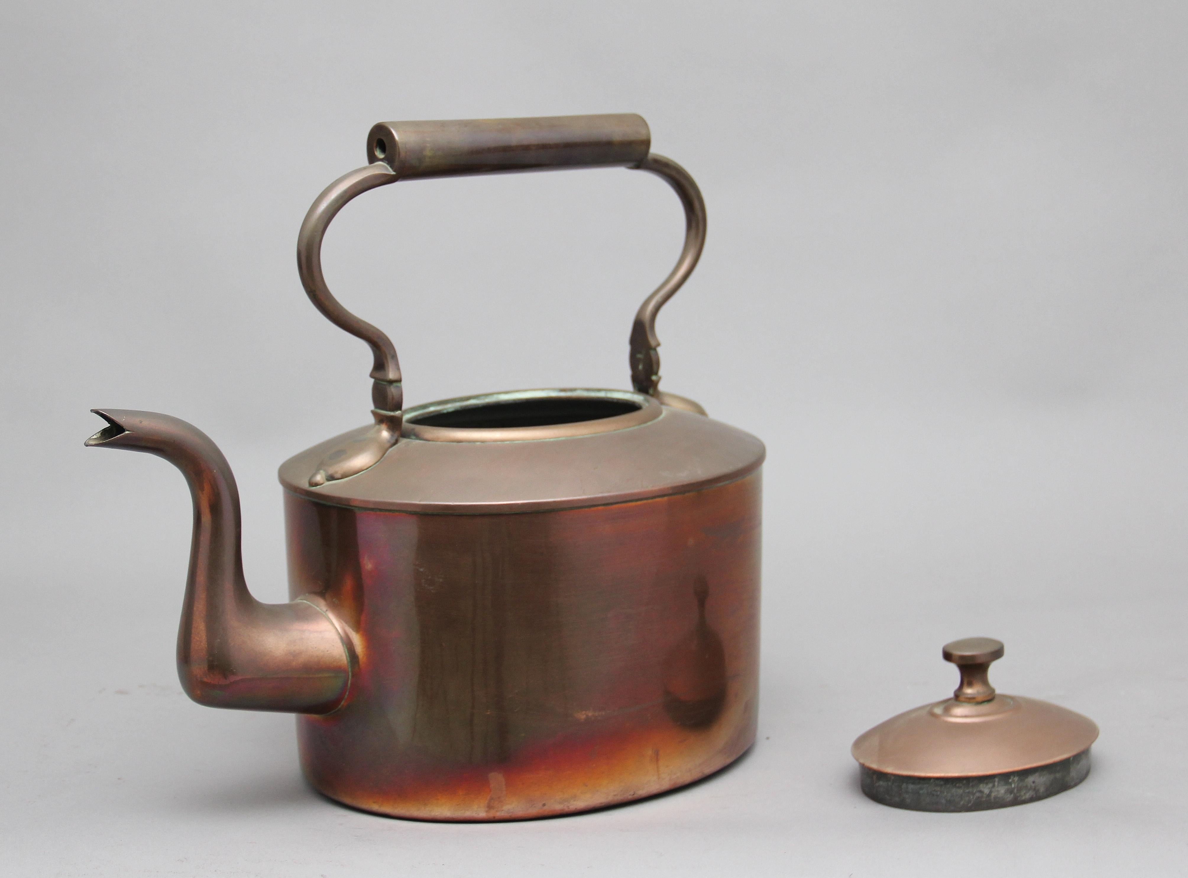 large antique copper kettle