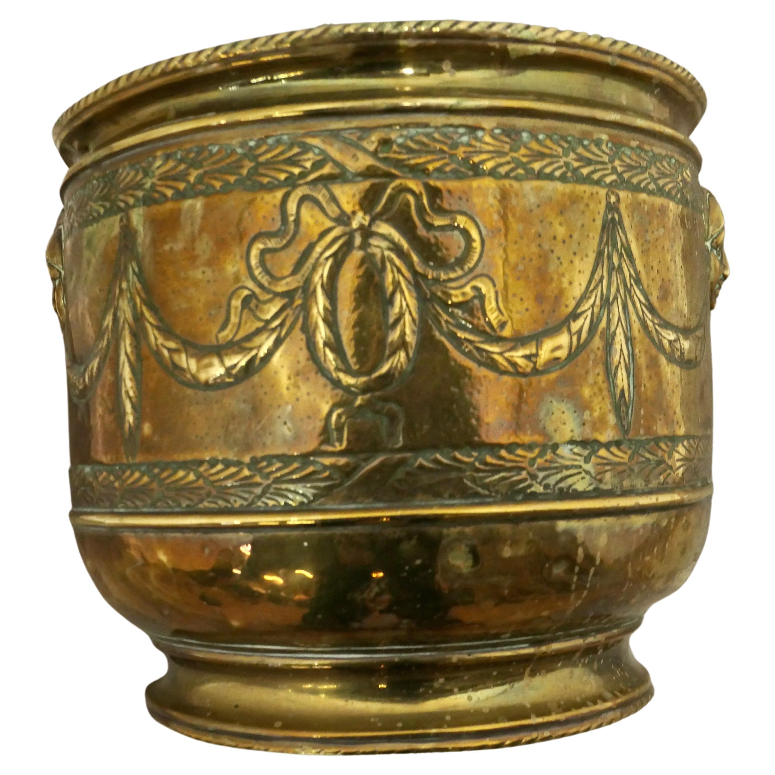 Large 19th Century Brass Jardinière with Faces For Sale