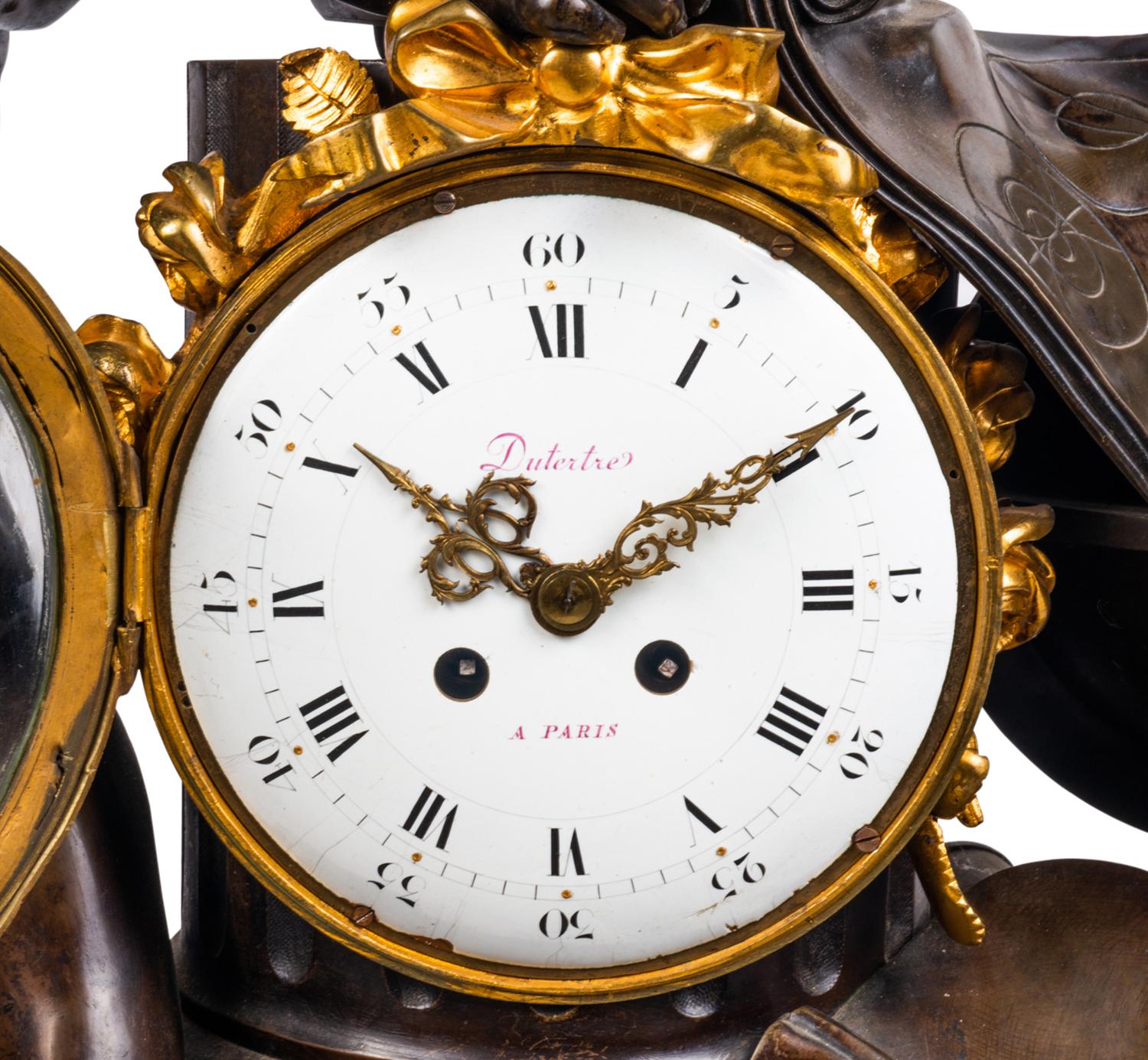 A wonderfully impressive 19th century Louis XVI style Cherub mantel clock with maps and a globe above a white enamel clock face, the eight day hour and half hour striking movement, raised on a gilded ormolu base.
Signed; Dutertre, Paris.