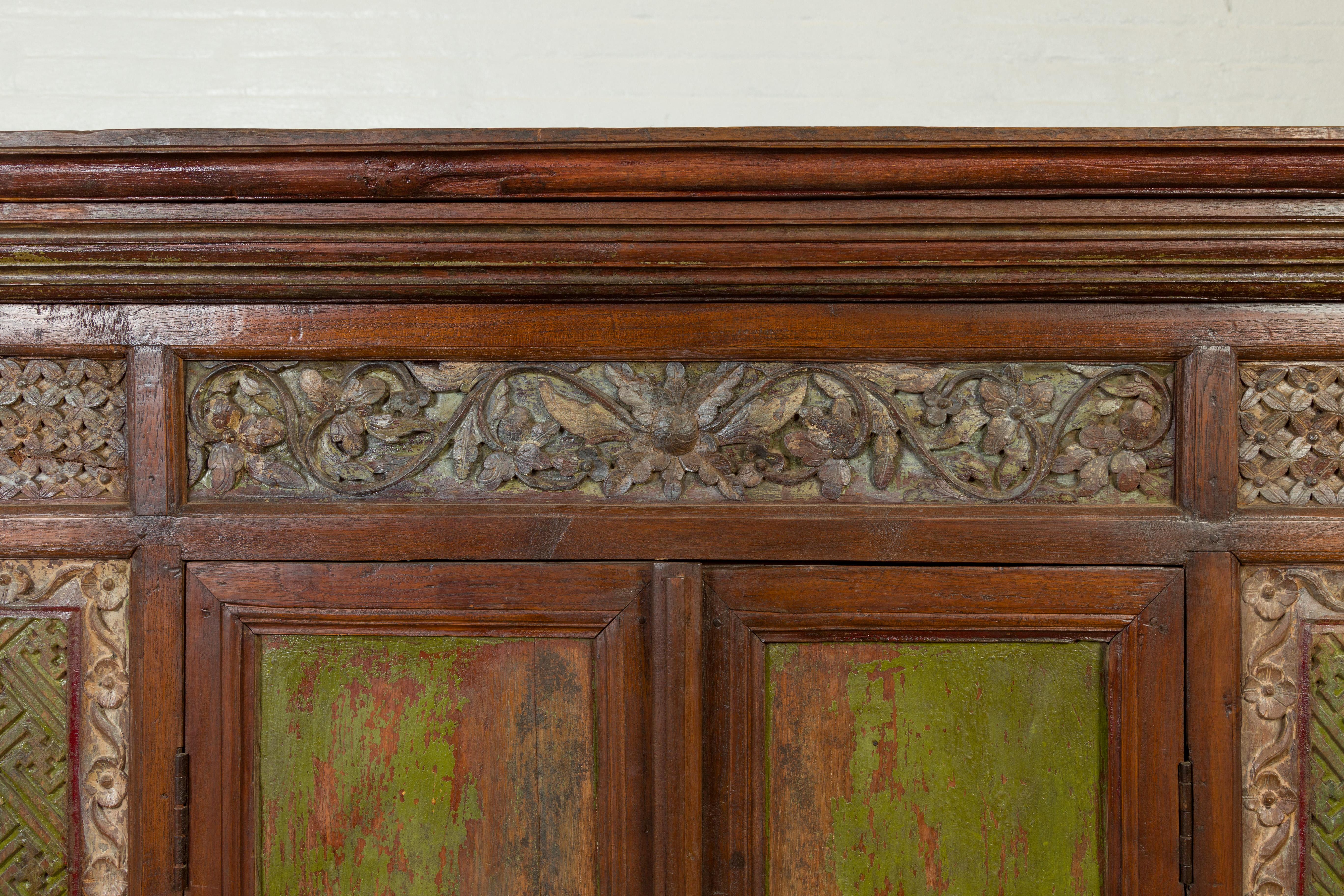 Large 19th Century Cabinet with Carved Floral Motifs and Distressed Verde Finish For Sale 1