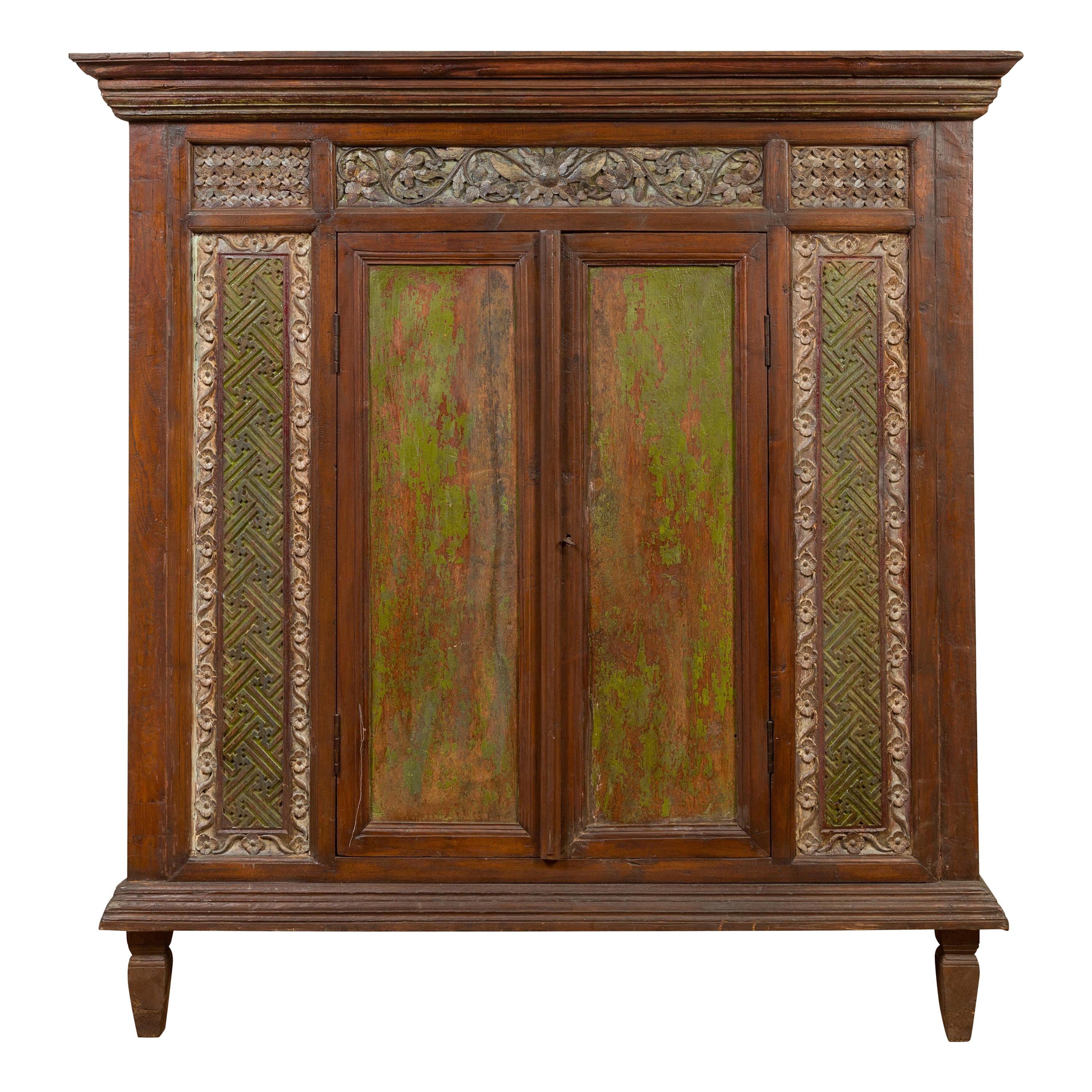 Large 19th Century Cabinet with Carved Floral Motifs and Distressed Verde Finish For Sale