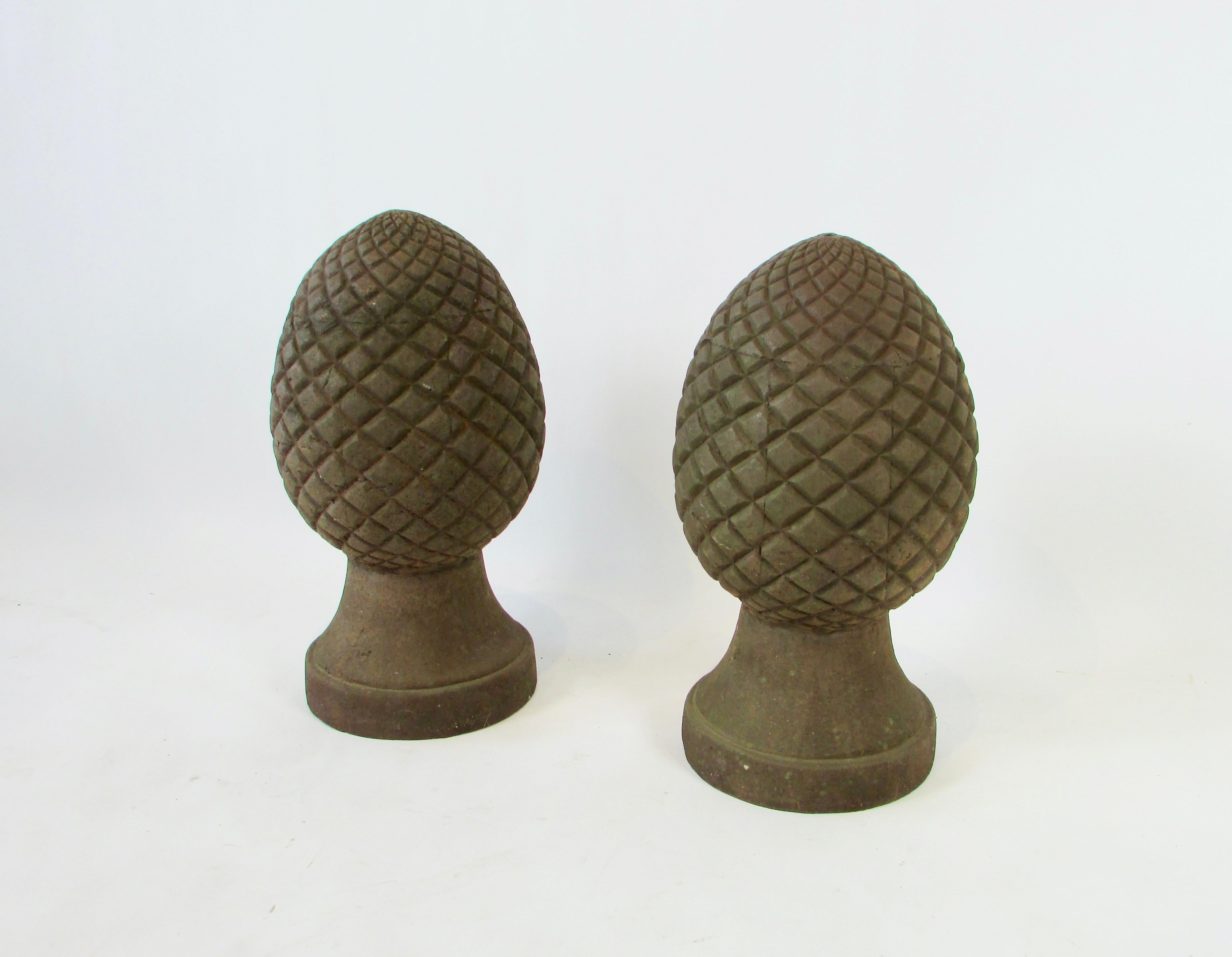 Pair of large (and heavy) cast iron finials for garden or home decoration. 19th century manufacture but have a certain modernist style.