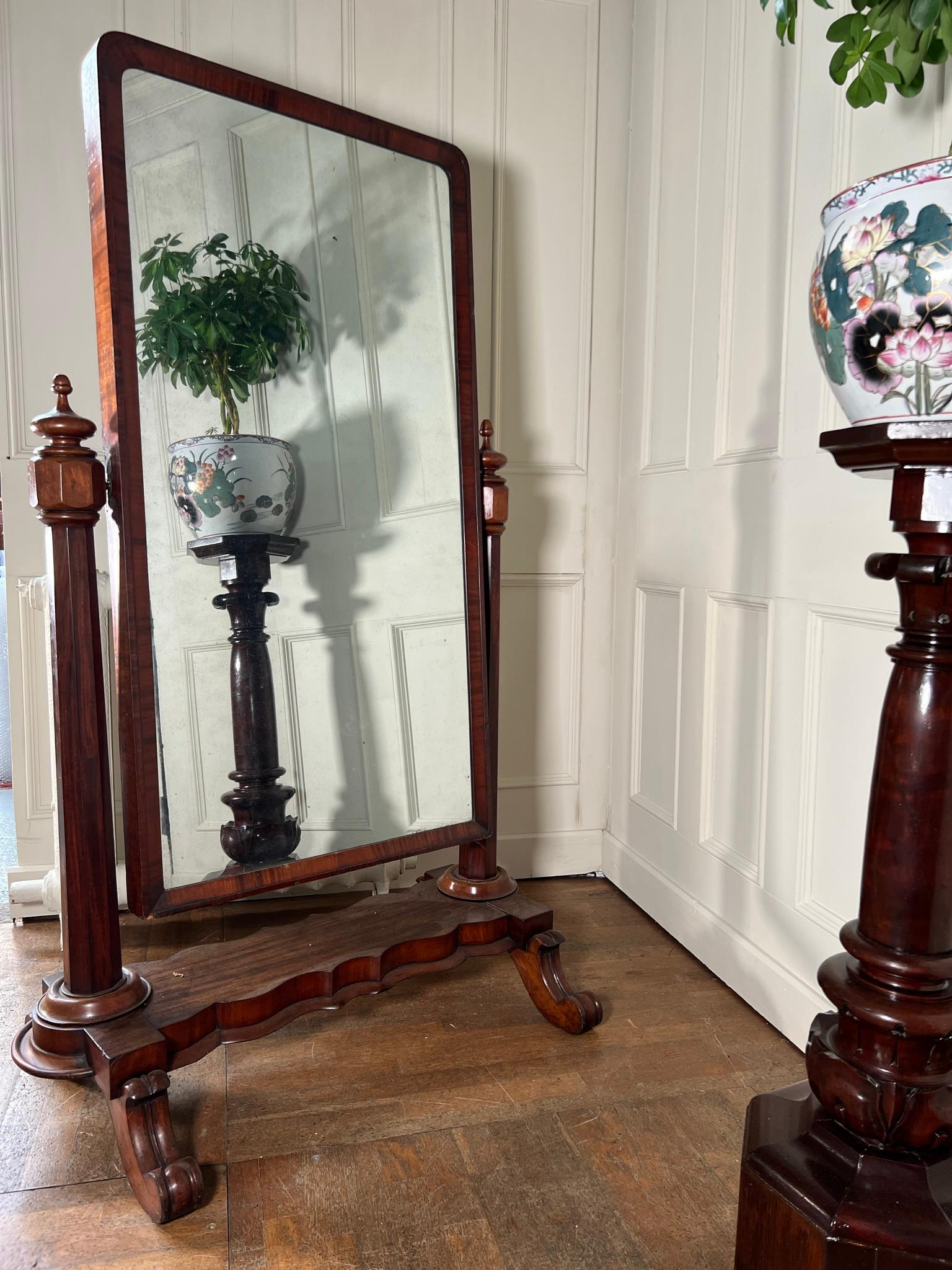 Large 19th century Cheval dressing mirror of county house proportions.

Nice foxing to the mirror plate and a great looking sturdy mahogany frame.

Measurements: 160cm h x 96cm w stand / 66.5cm w mirror x 65cm d stand

(measurements are approximate