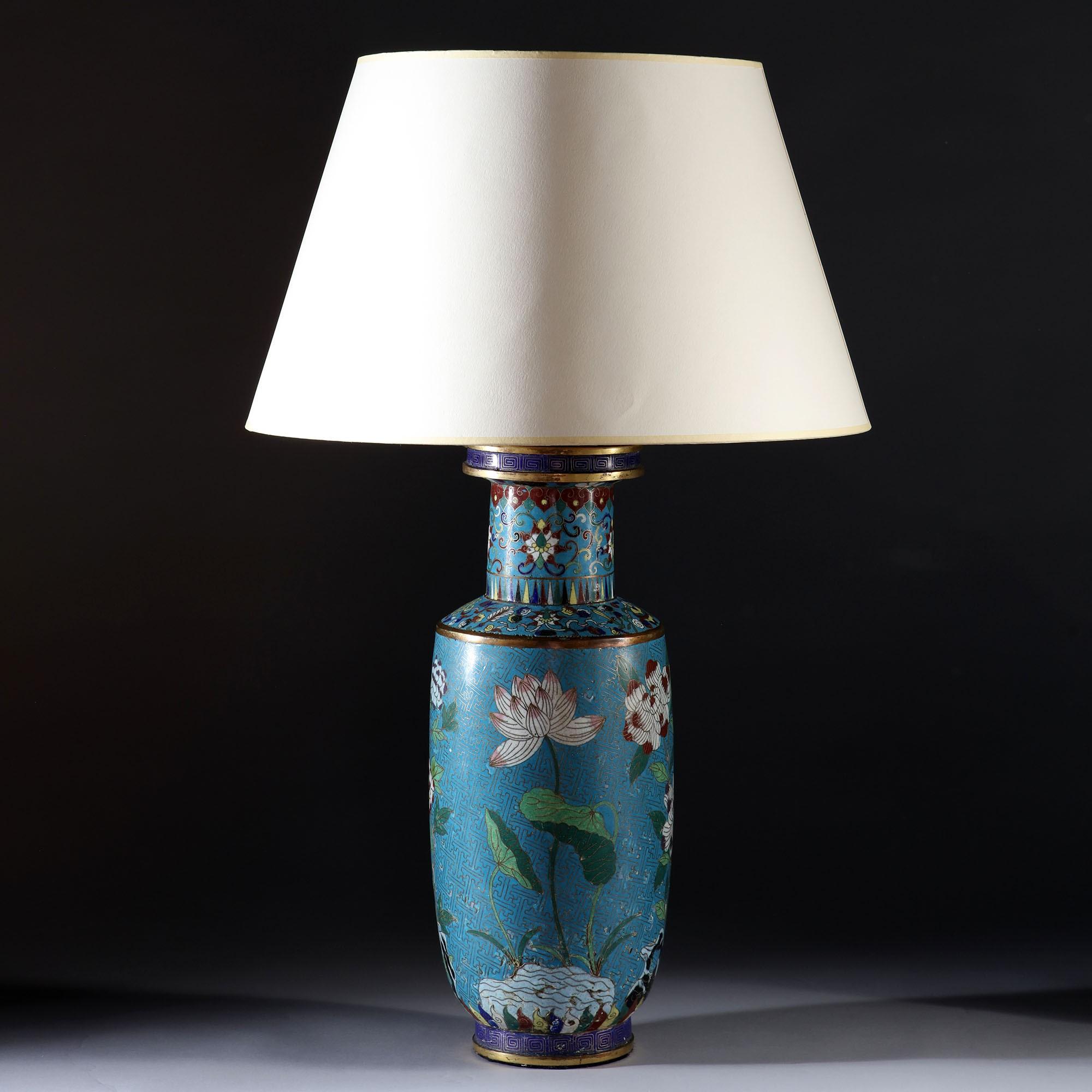 A fine 19th century cloisonné vase, decorated with growing orchids and floral motifs, now mounted as a lamp.


Please note: Lampshade not included.