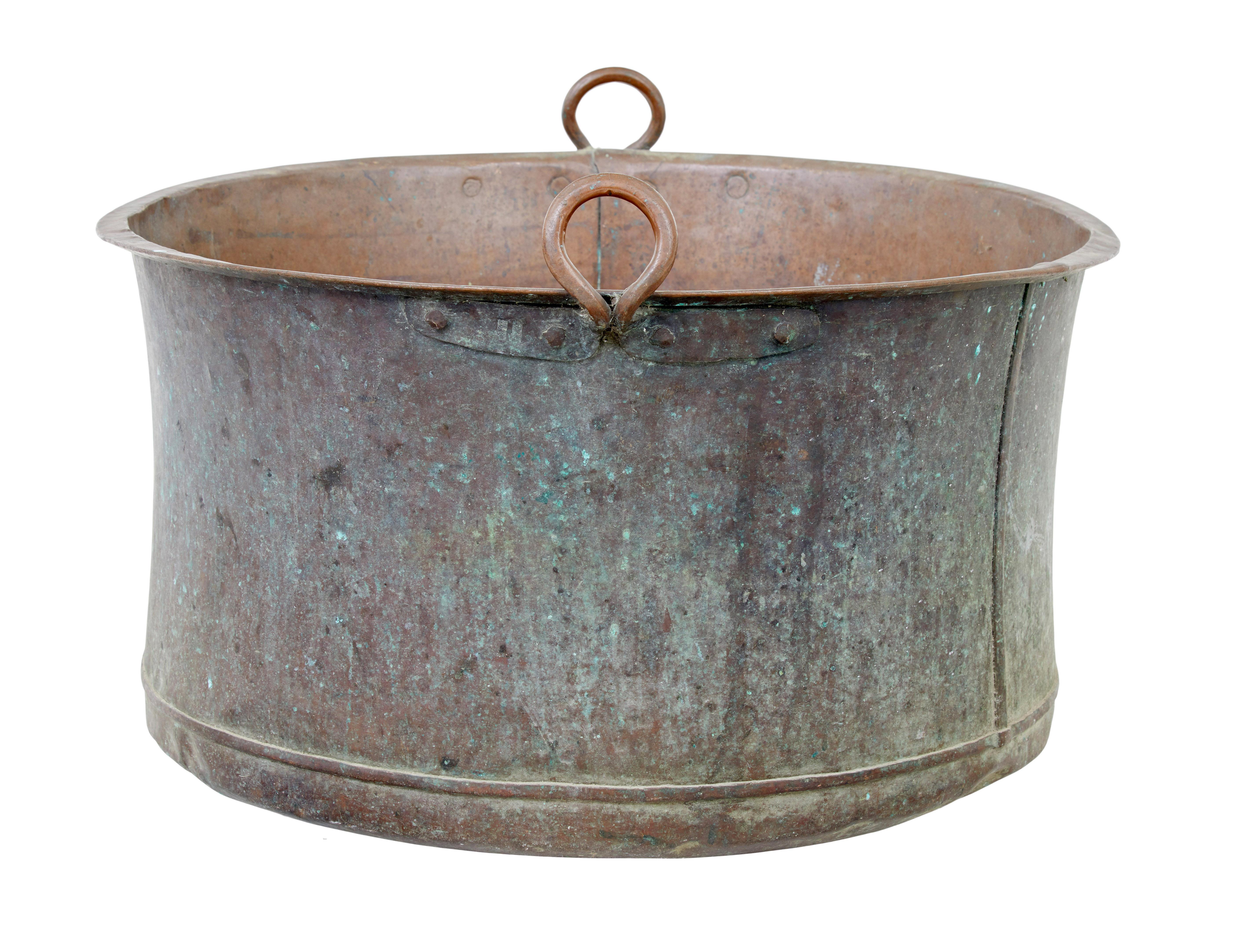 Large 19th century cooking pot with original patina circa 1880.

We are pleased to offer this large cooking pot, complete with it's original patina which has been many years in the making.

Used in large household kitchens of the 19th century, this