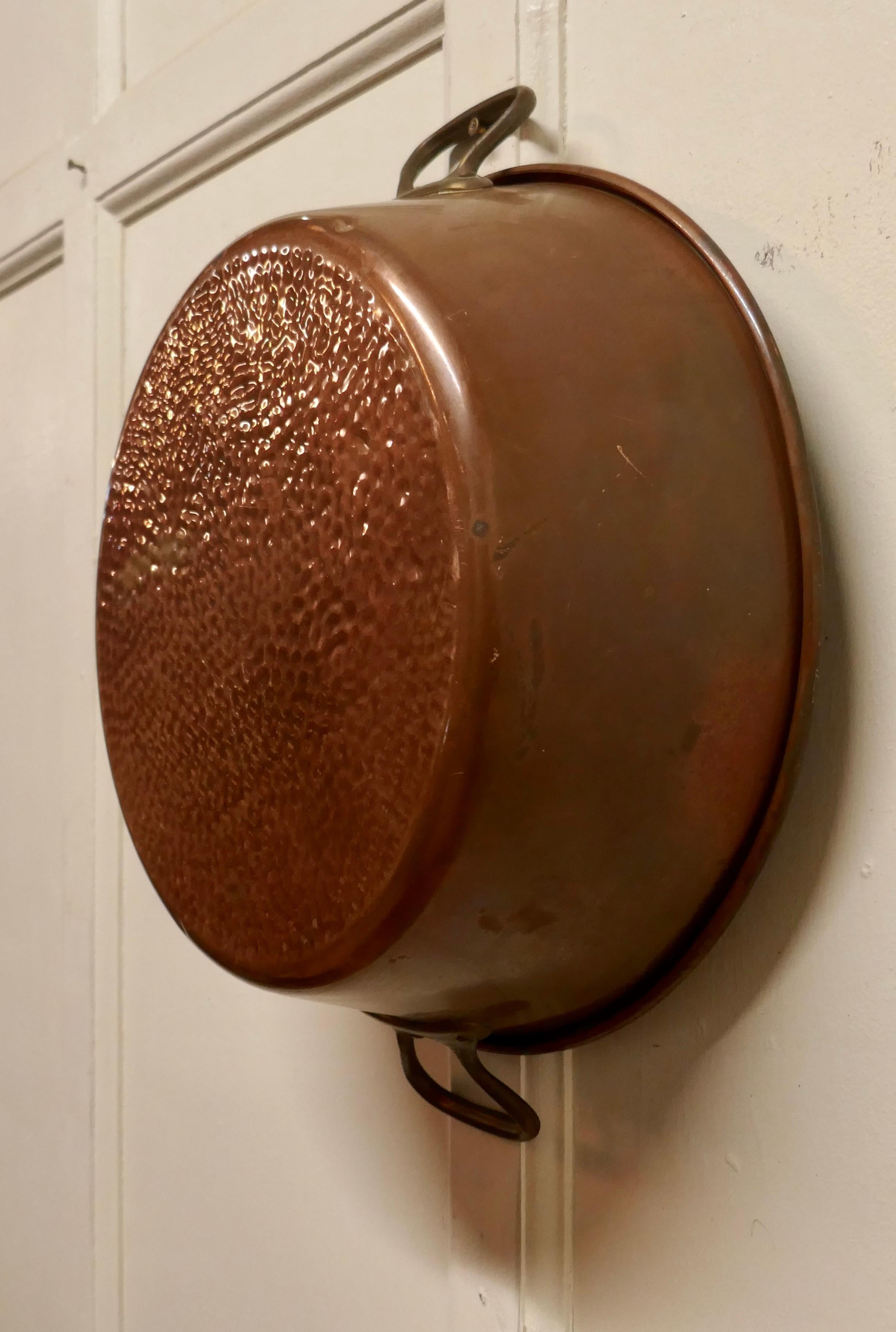 Arts and Crafts Large 19th Century Double Handled Beaten Copper Pan For Sale