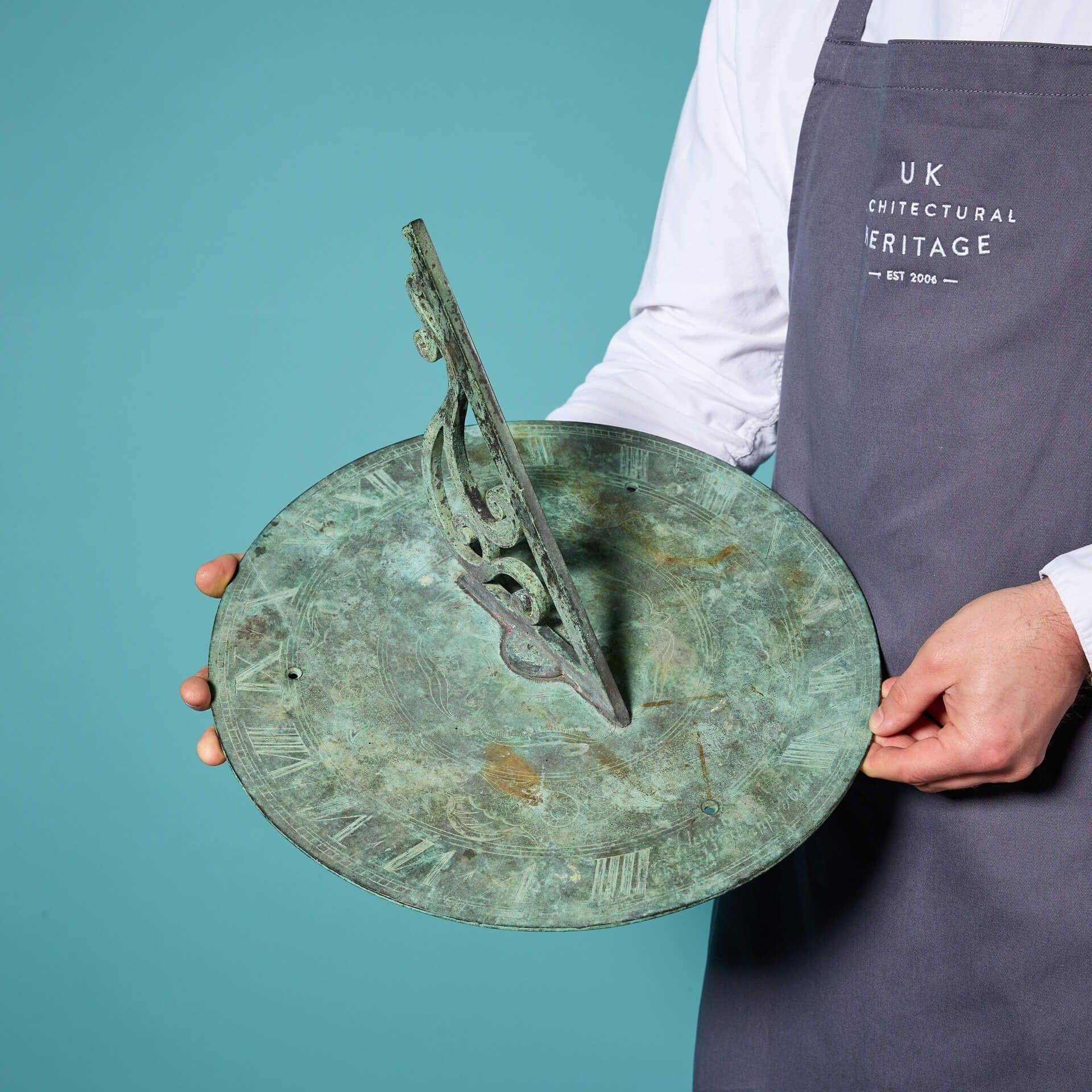 A large 19th century English bronze round sundial plate with Verdigris finish in very good condition, circa 1870.

Made in bronze, this horizontal sundial plate has stood the test of time for over 155 years.

Though weathered with a character