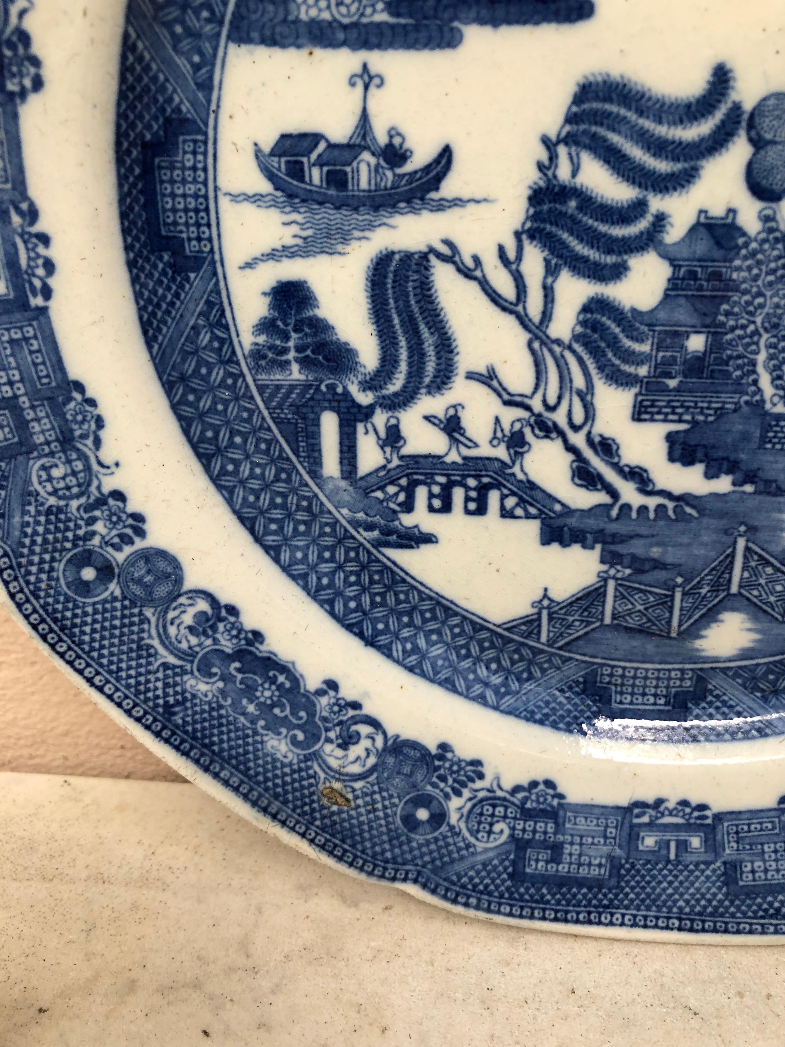 19th century English Chinoiserie blue & white plate.
Measure: 9.5 inches diameter.