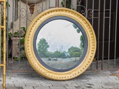 Large 19th Century English Giltwood Convex Mirror with Ebonized Inner Trim