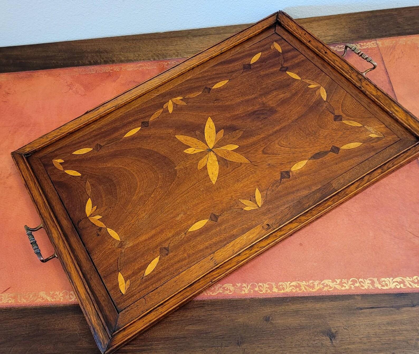 A large late 19th century English mahogany inlaid decorative serving tray with beautiful warm patina. Circa 1890

Born in England, hand-crafted of rich solid mahogany, outstanding coloring, warmth, superb highly figured grain detailing, and soft