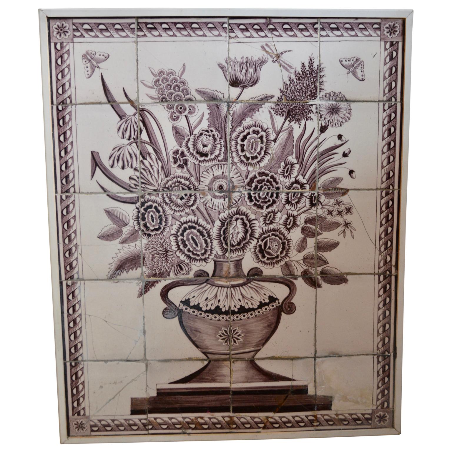 Large 19th century framed delft tile flower motif. 

Framed delft tile monochrome purple vase with flower motif.