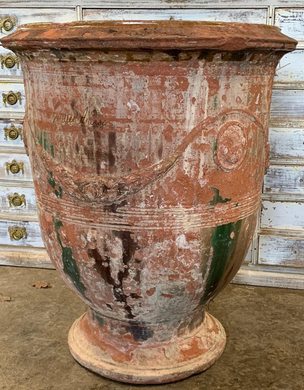 A beautiful early 19th century terracotta Anduze planter. This one is made by the renowned Gautier family in Anduze and is clearly signed on one side. It has a beautiful weathered look which is all original. These were purchased by the wealthy and