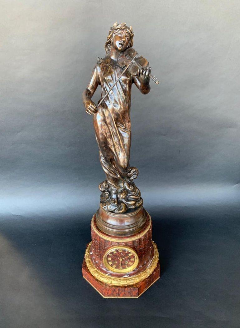 Large 19th century French bronze clock signed by Jean Garnier
Jean Garnier was a 19th century French sculptor best known for his bronze figures and decorative vessels. Born in 1853 in Mouzeuil, France, Garnier would go on to exhibit at the Salon des