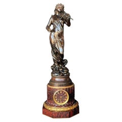 Gran reloj francés de bronce del siglo XIX firmado por Jean Garnier