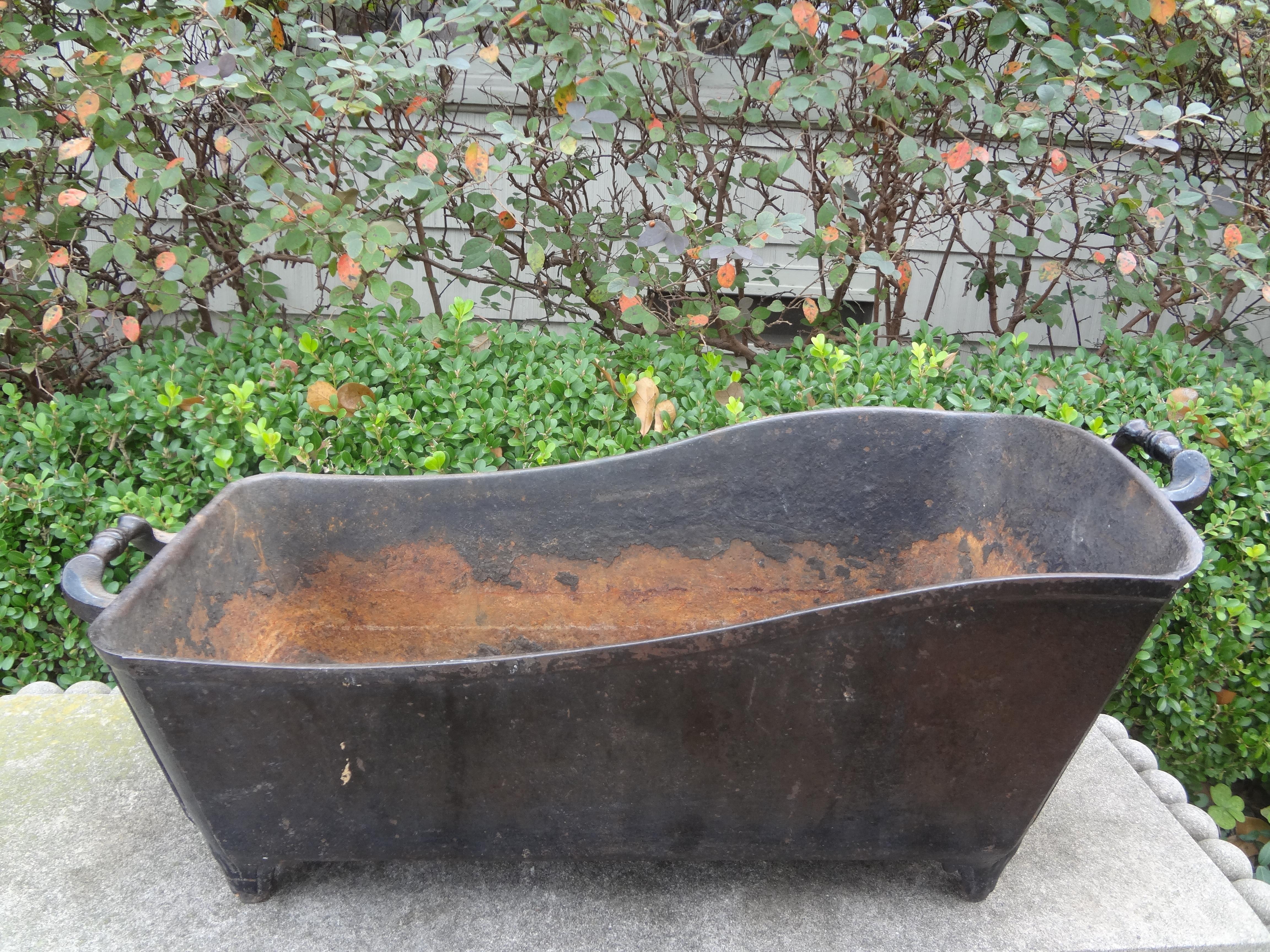 19th Century French cast iron jardiniere or planter. This stunning large scale Antique French iron planter or cachepot will accommodate a large orchid plant, blooming plants, green plants or a floral arrangement. Perfect dining table or coffee table