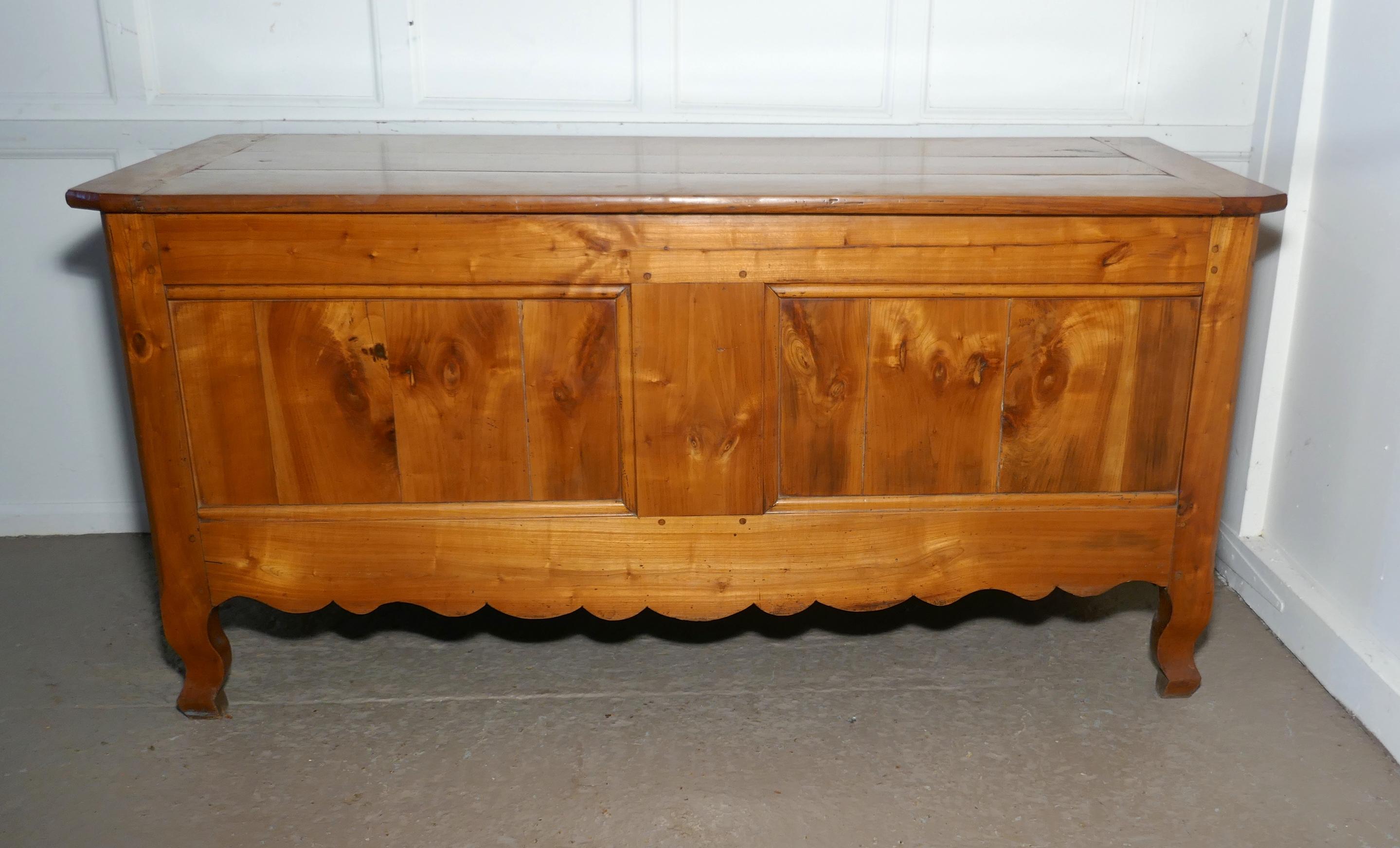 Large 19th century French cherry coffer or marriage chest 


This chest is a large piece it is made in thick cherrywood, so very heavy and stable, it has two large panels on the front with pretty scaloped bottom edge, it has a three plank cleated